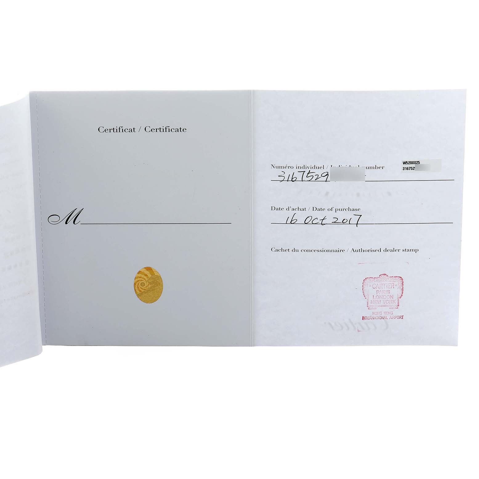 The image shows an open certificate booklet for the Cartier Tank Solo W5200025 Men
s Steel and Gold (two tone) Silver Dial watch, displaying purchase details and dealer stamp.