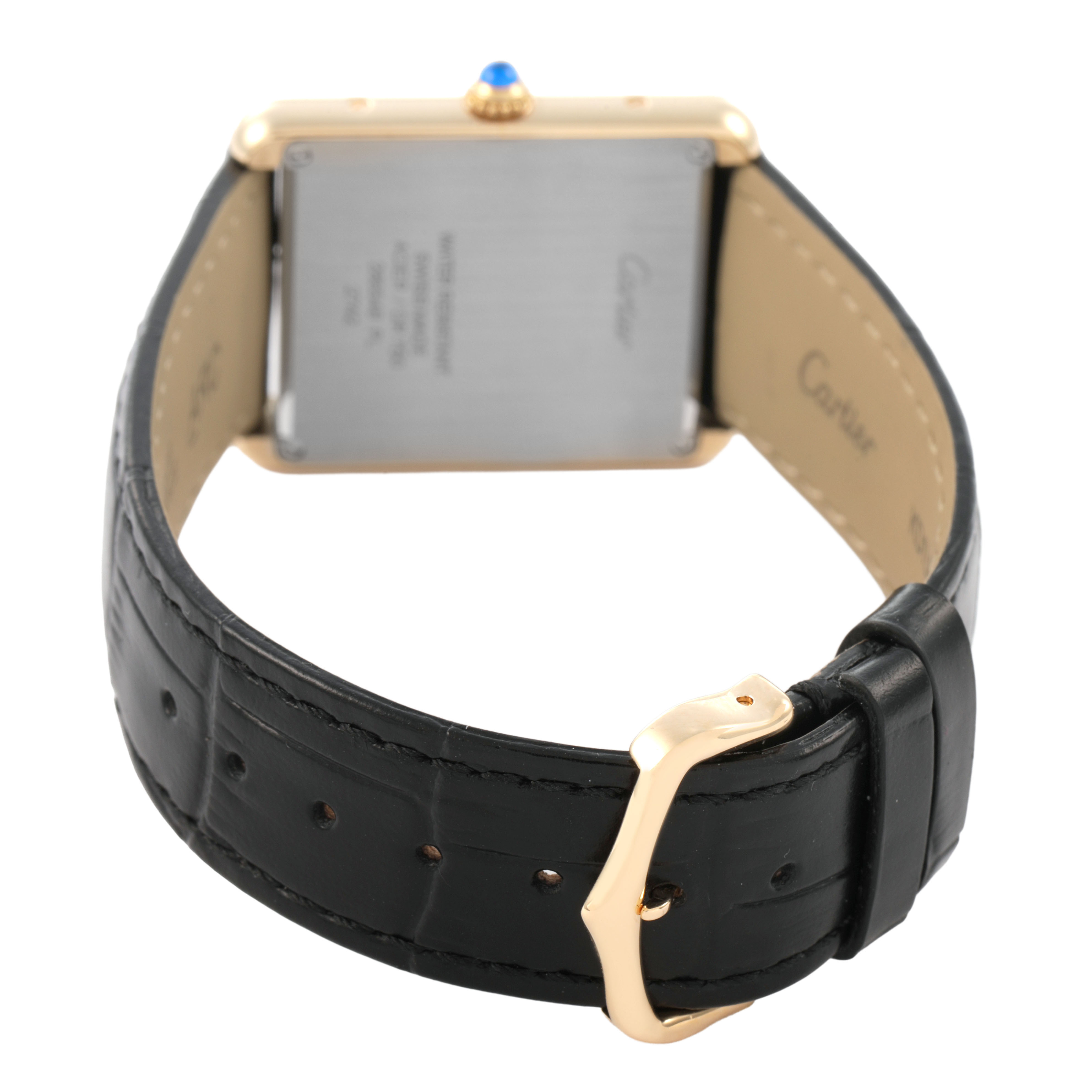 The image shows the back view of a Cartier Tank Solo W1018855 Men's Yellow Gold Silver Dial watch, highlighting the strap, buckle, and case back.