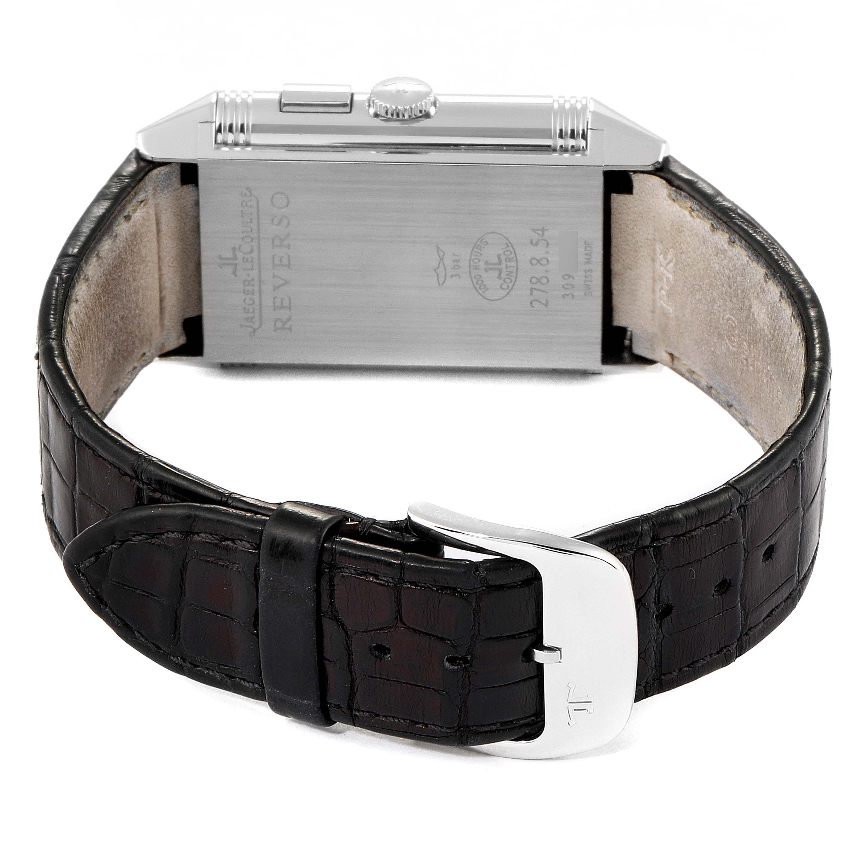 This image shows the back case and leather strap of a Jaeger-LeCoultre Reverso watch.