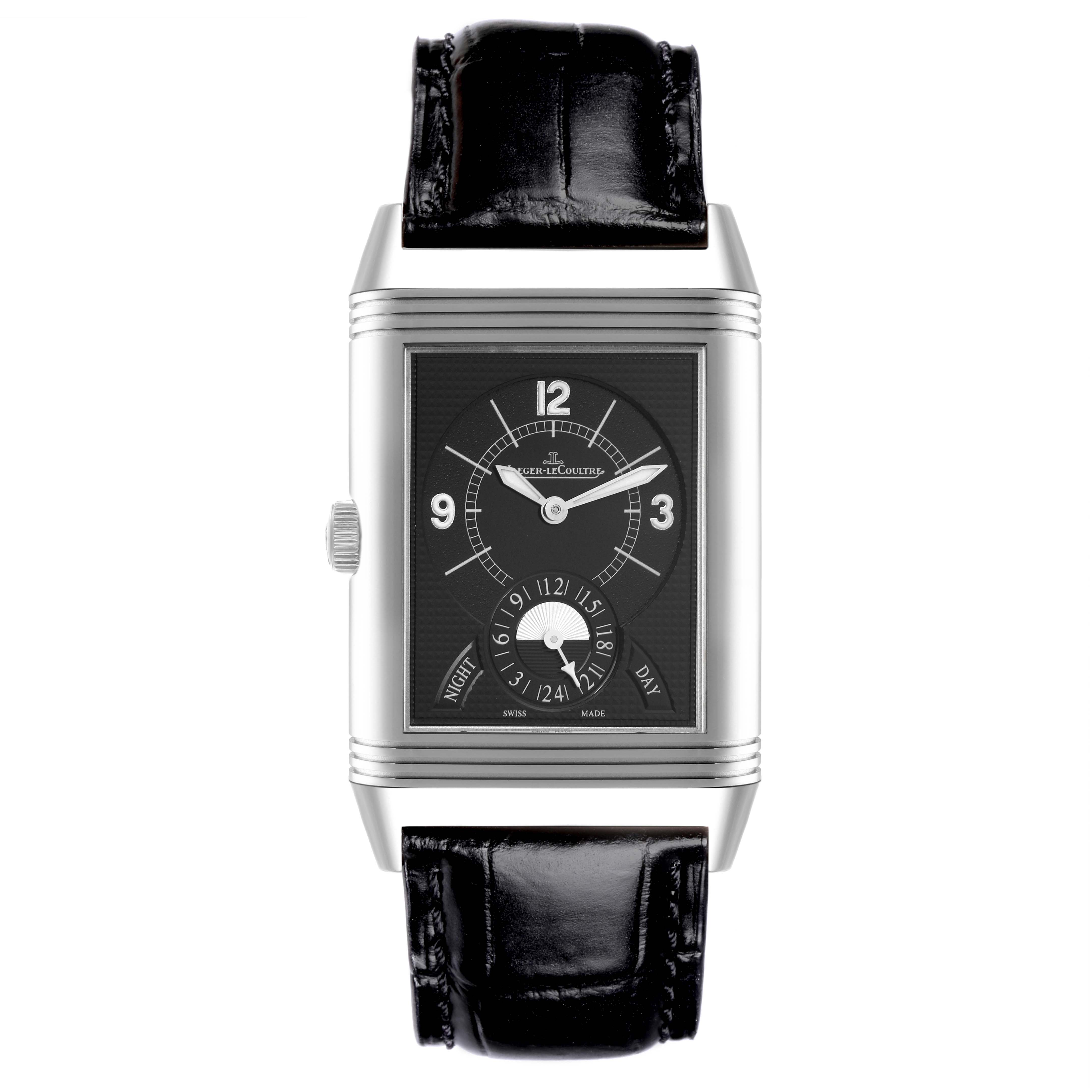The Jaeger-LeCoultre Reverso watch is shown from the front, displaying the dial and a moon phase complication.