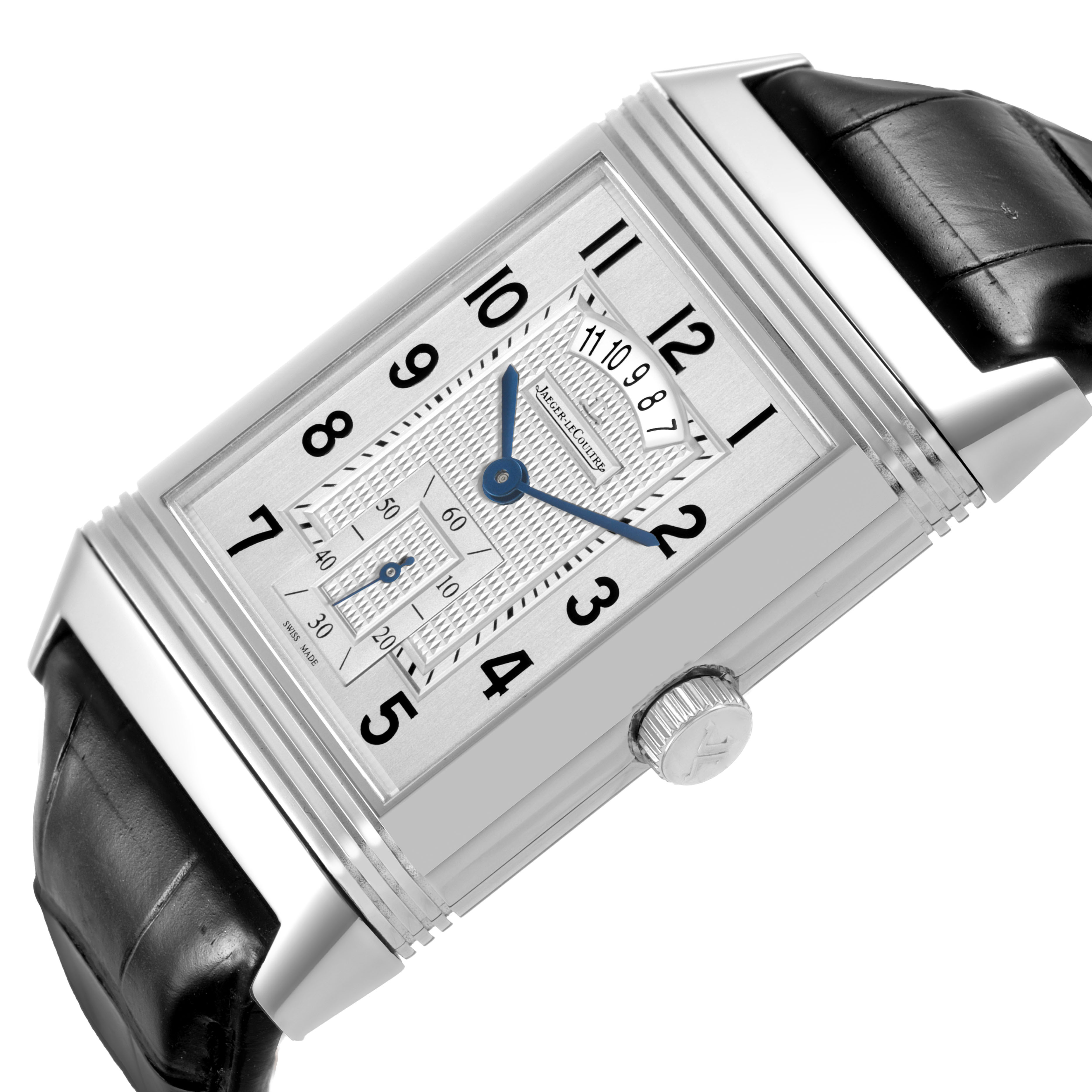 The Jaeger-LeCoultre Reverso watch is shown at an angle highlighting the rectangular face, crown, and part of the leather strap.