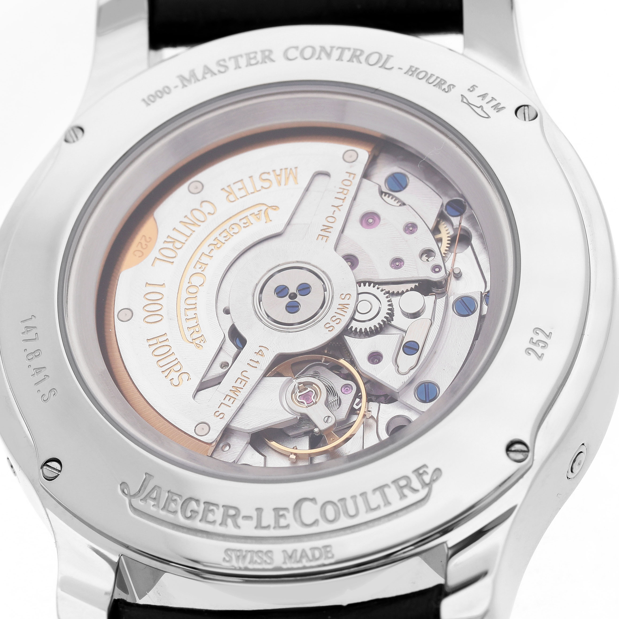 The image shows the back case of a Jaeger-LeCoultre Master watch, highlighting the movement and engravings.