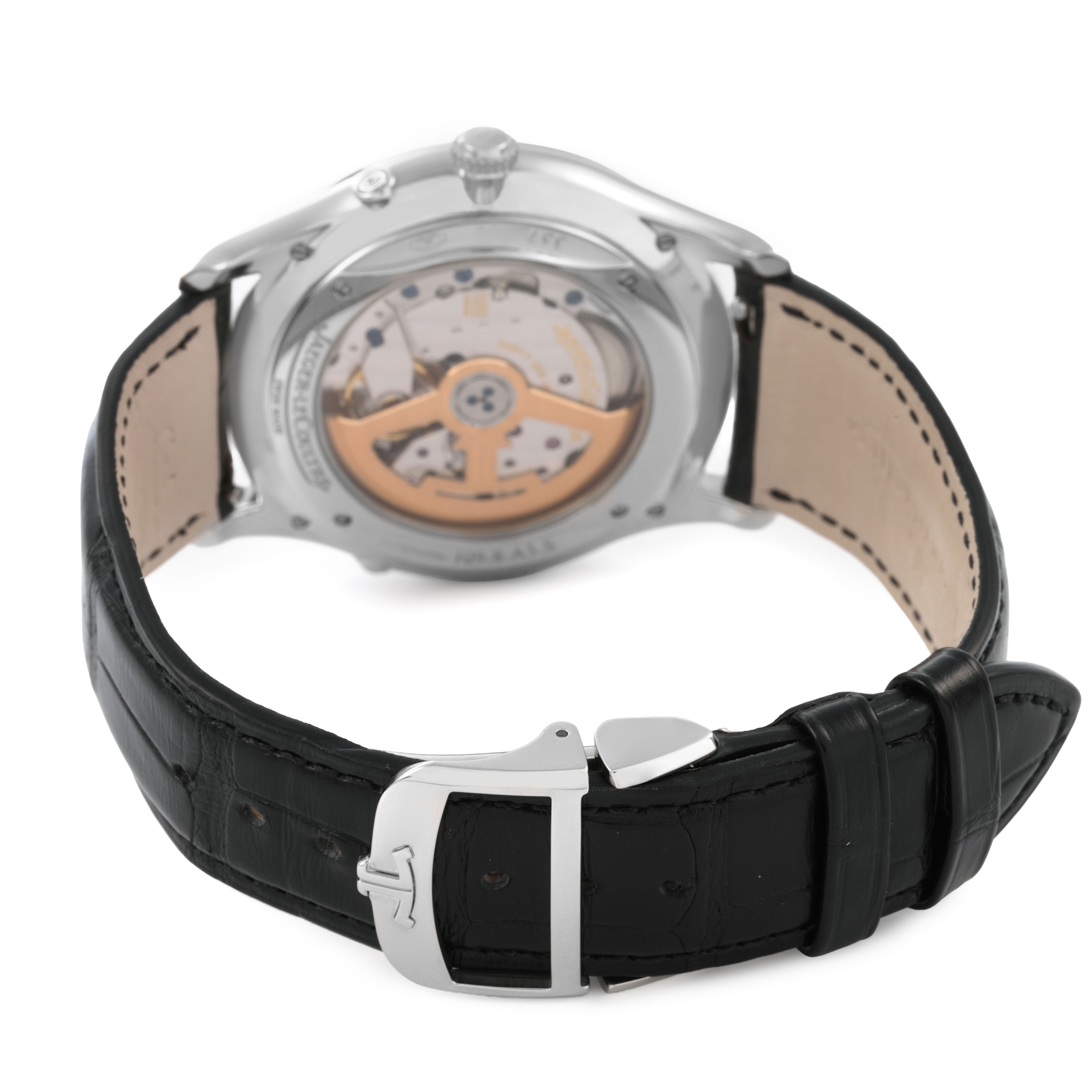 The image shows the back of the Jaeger-LeCoultre Master watch, highlighting the movement and leather strap with a buckle.