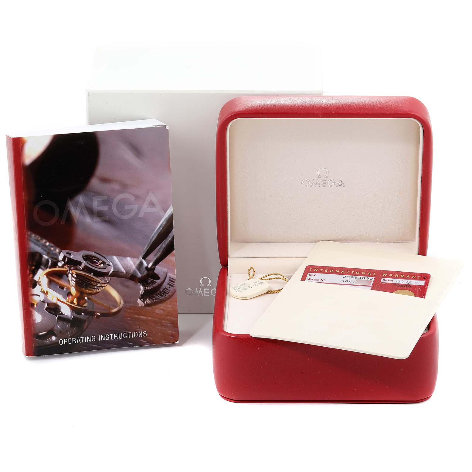 The image shows the packaging and accessories of an Omega Seamaster 2595.30.00 Men's Stainless Steel Silver Dial 2595.30.00 Men's Stainless Steel Silver Dial, including a red box, international warranty card, hang tag, and instruction manual.