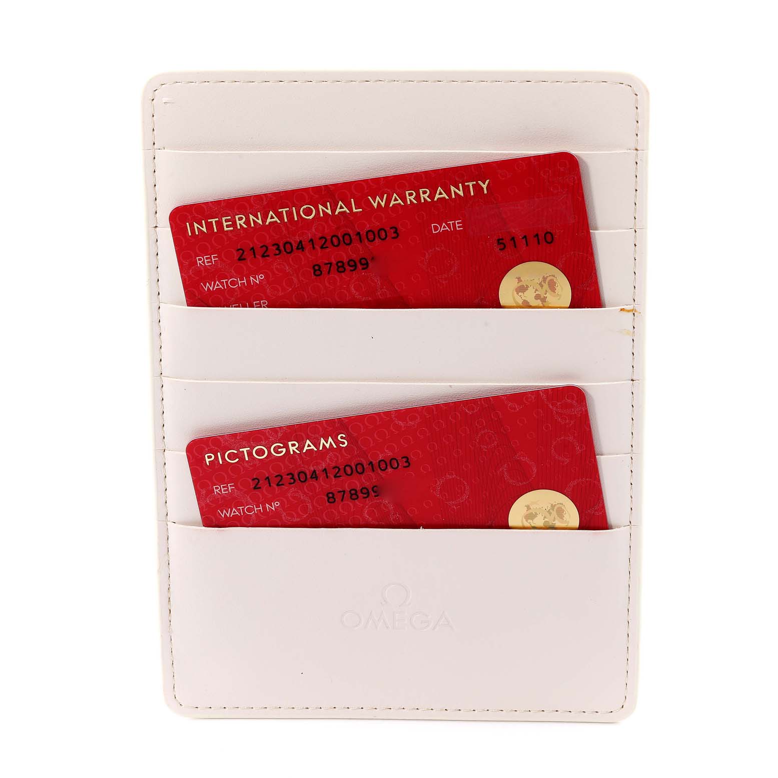 The image shows warranty and pictogram cards in a white holder for an Omega Seamaster 212.30.41.20.01.003 Men's Stainless Steel Black Dial 212.30.41.20.01.003 Men's Stainless Steel Black Dial watch.