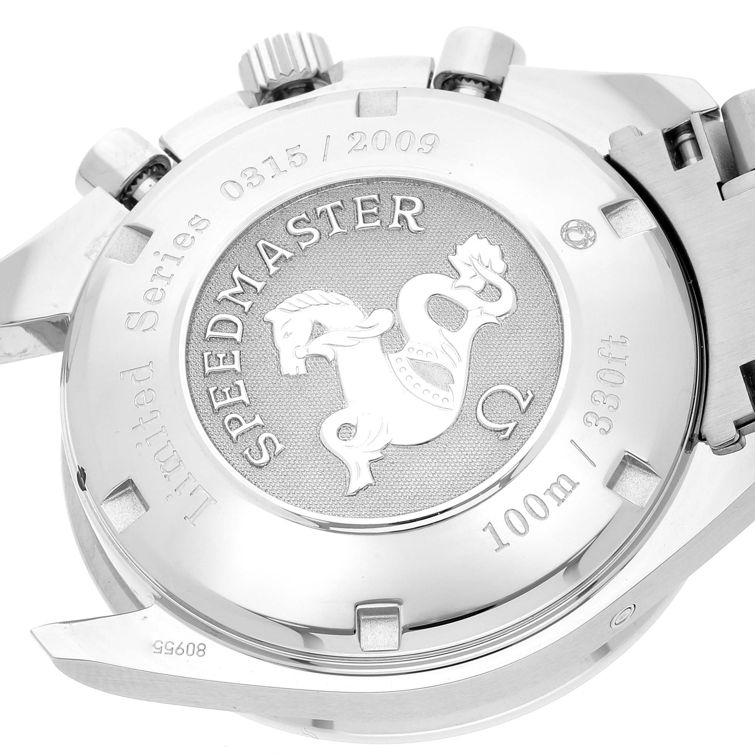 The image shows the back of an Omega Speedmaster 323.30.40.40.02.001 Men's Stainless Steel White Dial 323.30.40.40.02.001 Men's Stainless Steel White Dial watch, highlighting its case back and engravings.