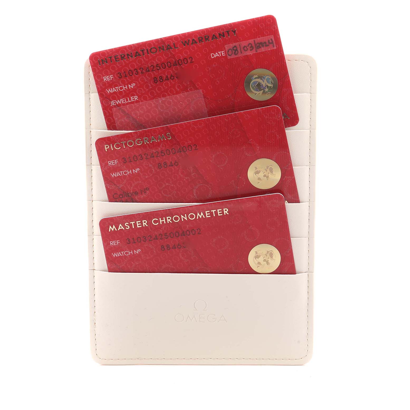 The image shows Omega Speedmaster 310.32.42.50.04.002 Men
s Stainless Steel White Dial model cards: International Warranty, Pictograms, and Master Chronometer, in a white holder.