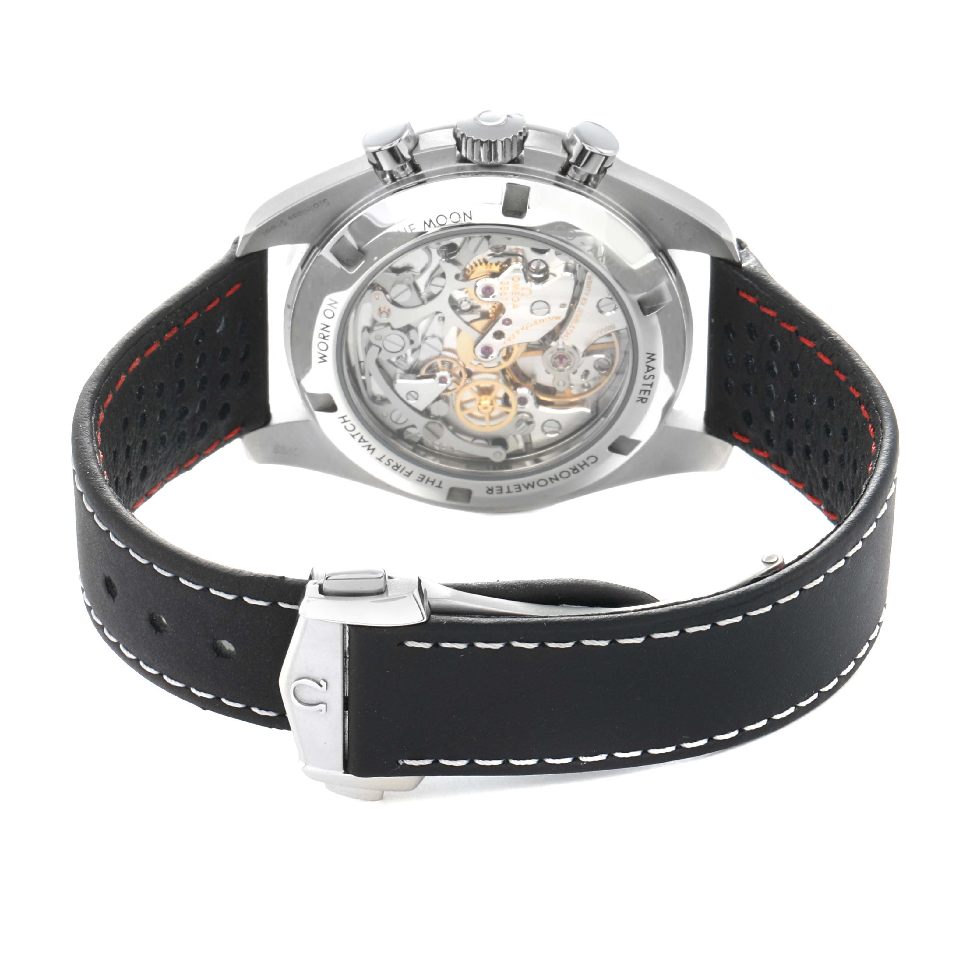 The image shows the Omega Speedmaster 310.32.42.50.04.002 Men
s Stainless Steel White Dial from the back, highlighting its transparent case back and black leather strap.