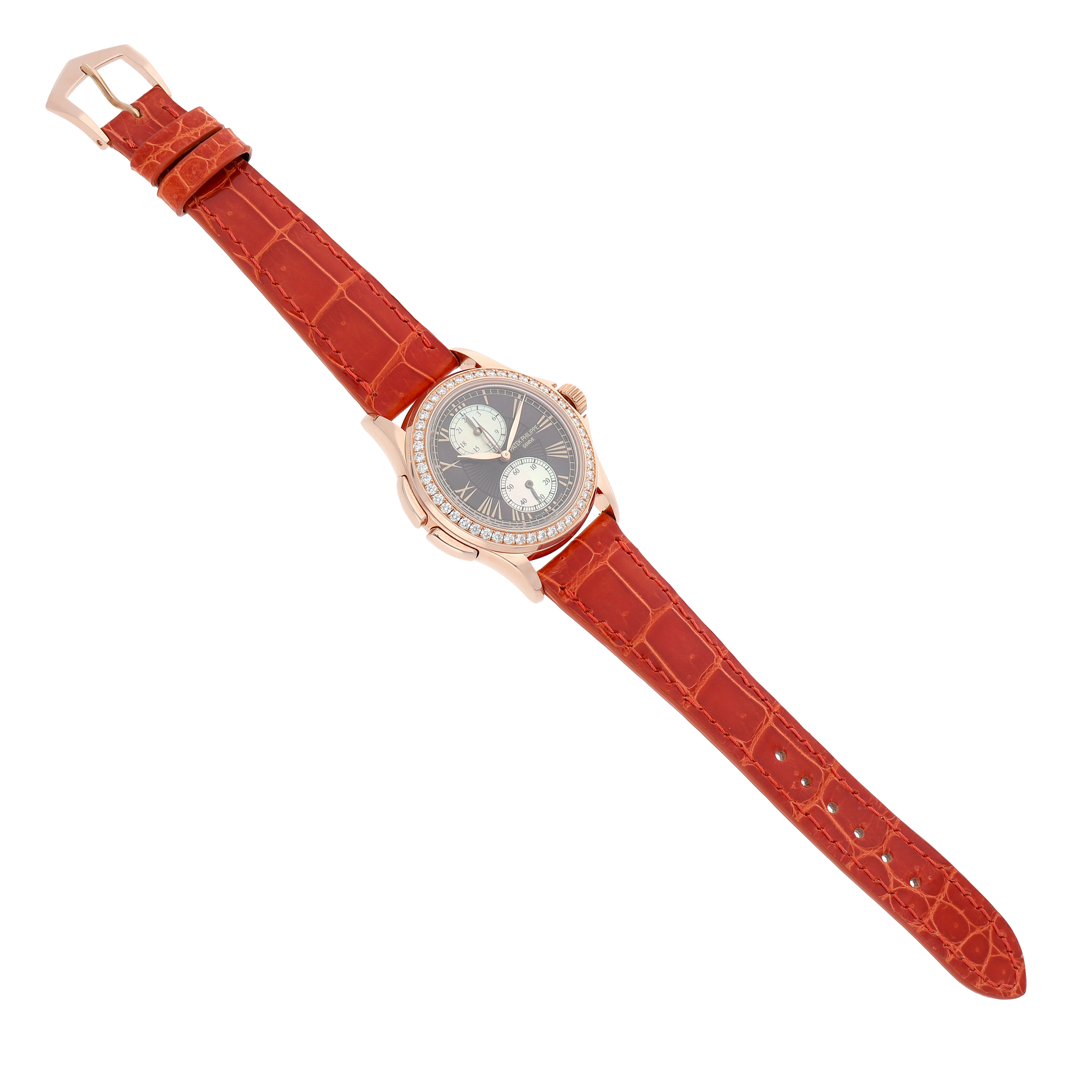 The Patek Philippe Calatrava 4934R-001 Women's Rose Gold Brown Dial watch is shown at a diagonal angle, displaying its face, bezel, and leather strap.