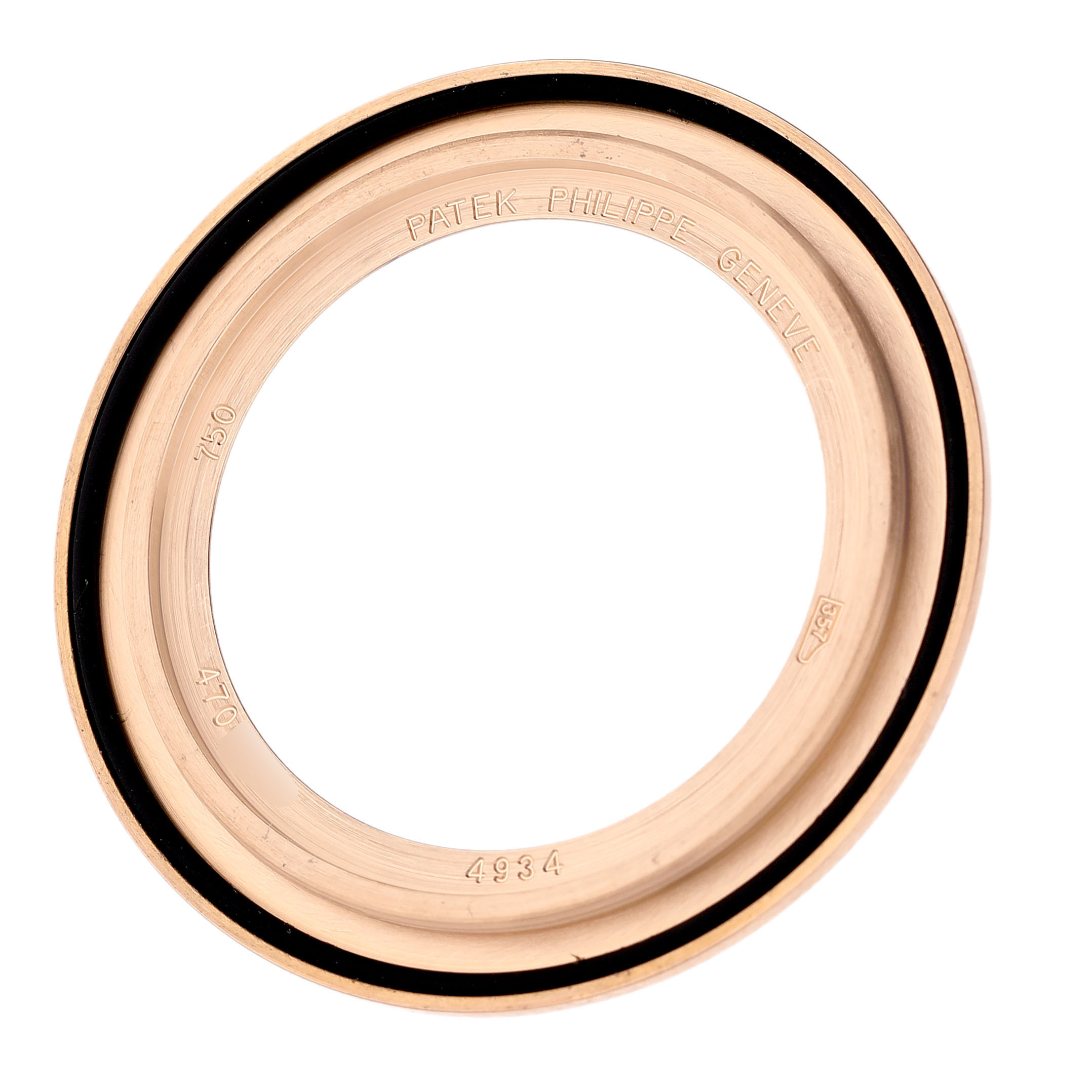 The image shows a top view of a Patek Philippe Calatrava 4934R-001 Women's Rose Gold Brown Dial watch bezel with engravings and an inner gasket.