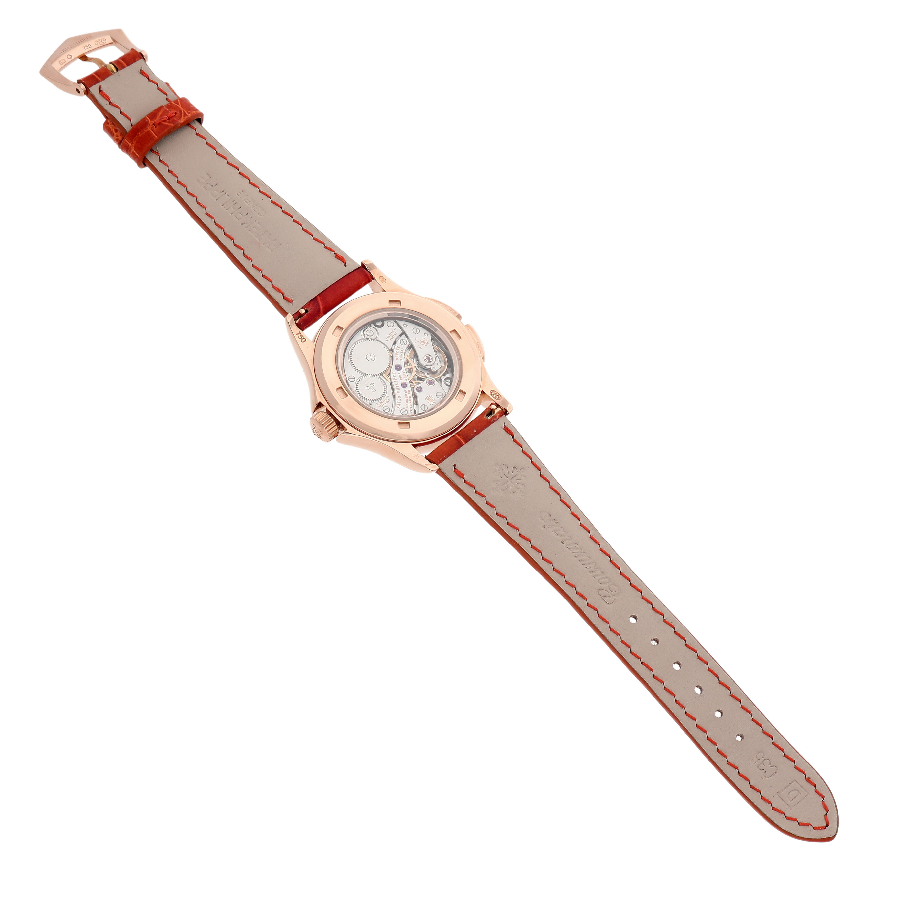 The image shows the back of the Patek Philippe Calatrava 4934R-001 Women's Rose Gold Brown Dial watch, highlighting the movement and leather strap.