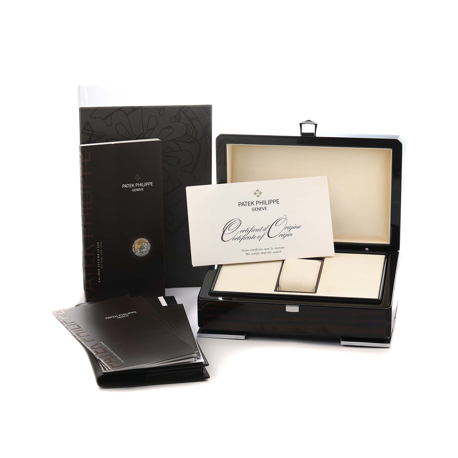 The image shows a Patek Philippe Complications 5205G Men
s White Gold Grey Dial watch box, documents, and a certificate.