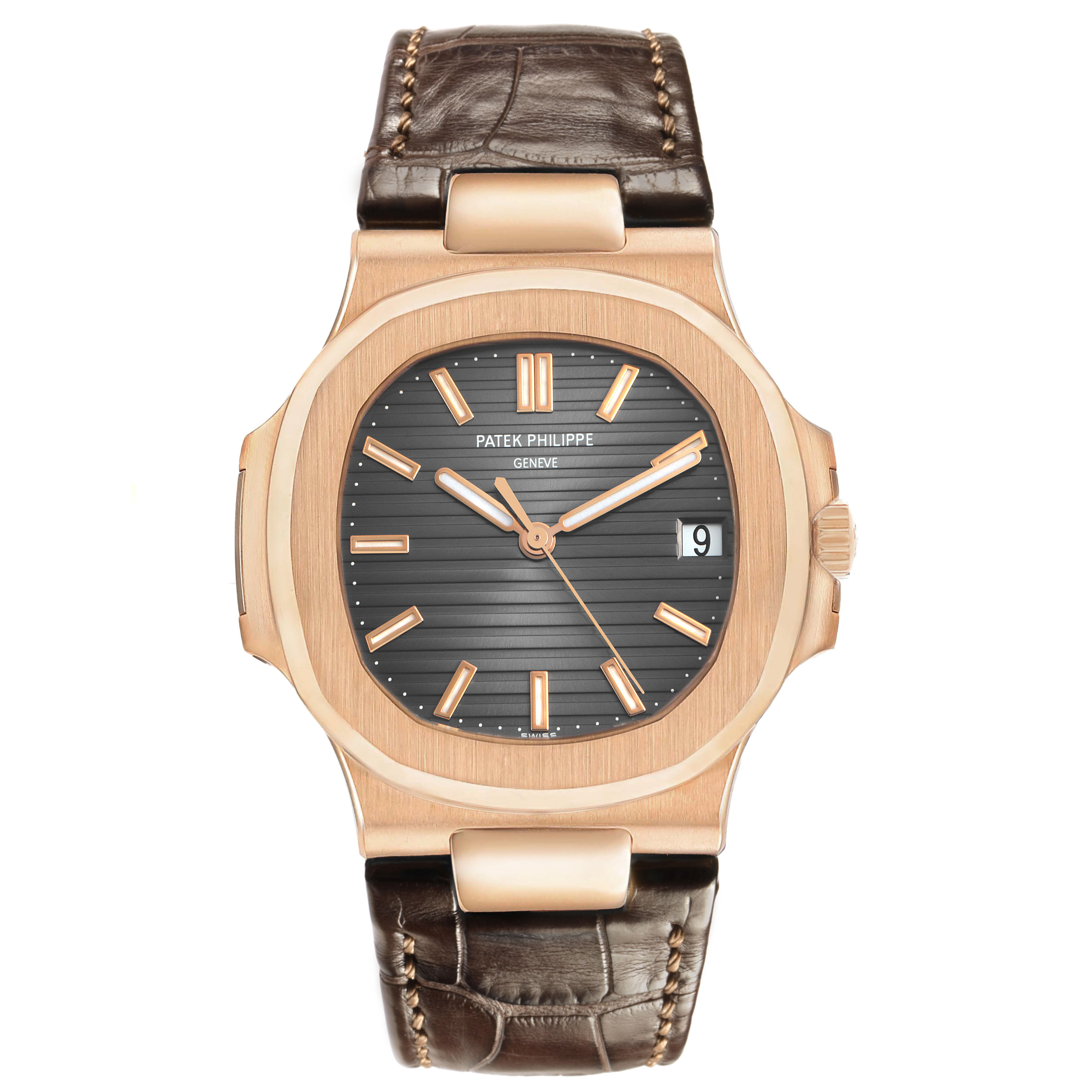 The Patek Philippe Nautilus 5711R-001 Men's Rose Gold Grey Dial watch is shown from a frontal angle, featuring a brown leather strap and a gold-toned case with a black dial.