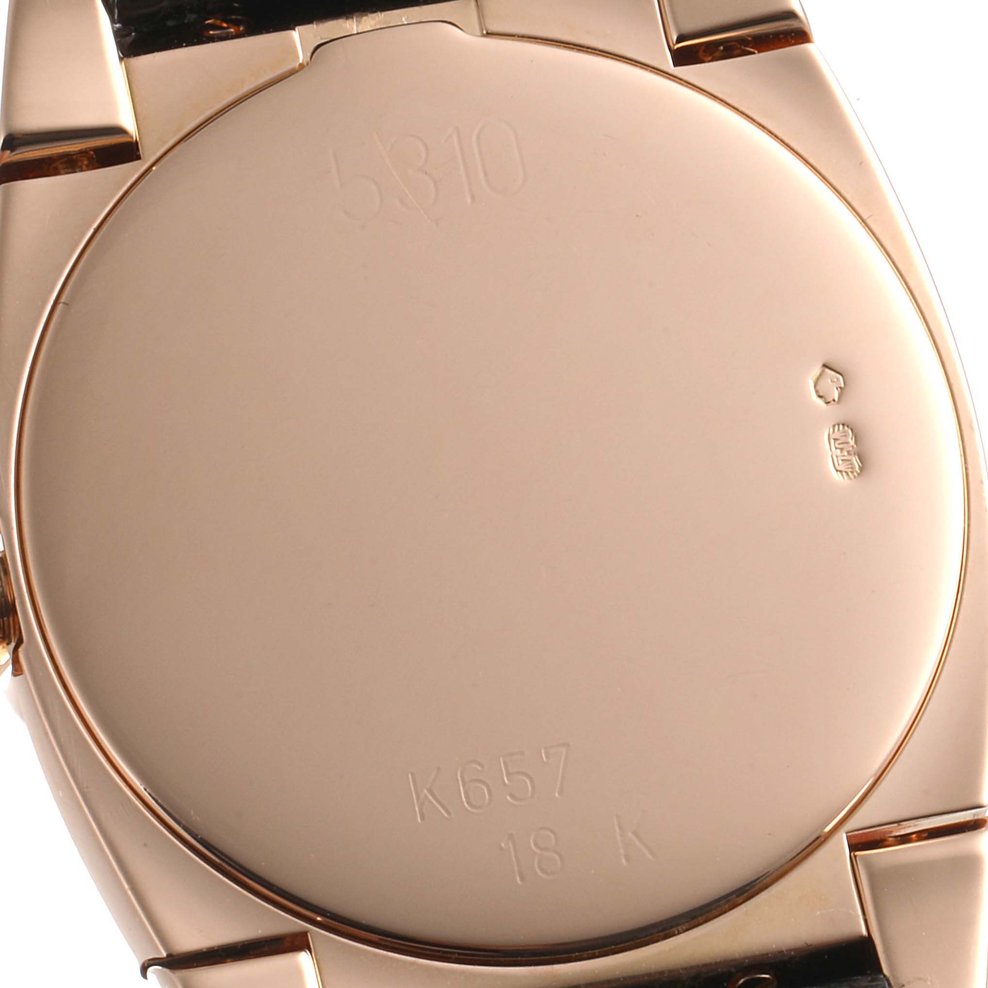 This image shows the back case of a Rolex Cellini 5310 Women's Rose Gold White Dial 5310 Women's Rose Gold White Dial watch, including engravings and marks, viewed from the rear.