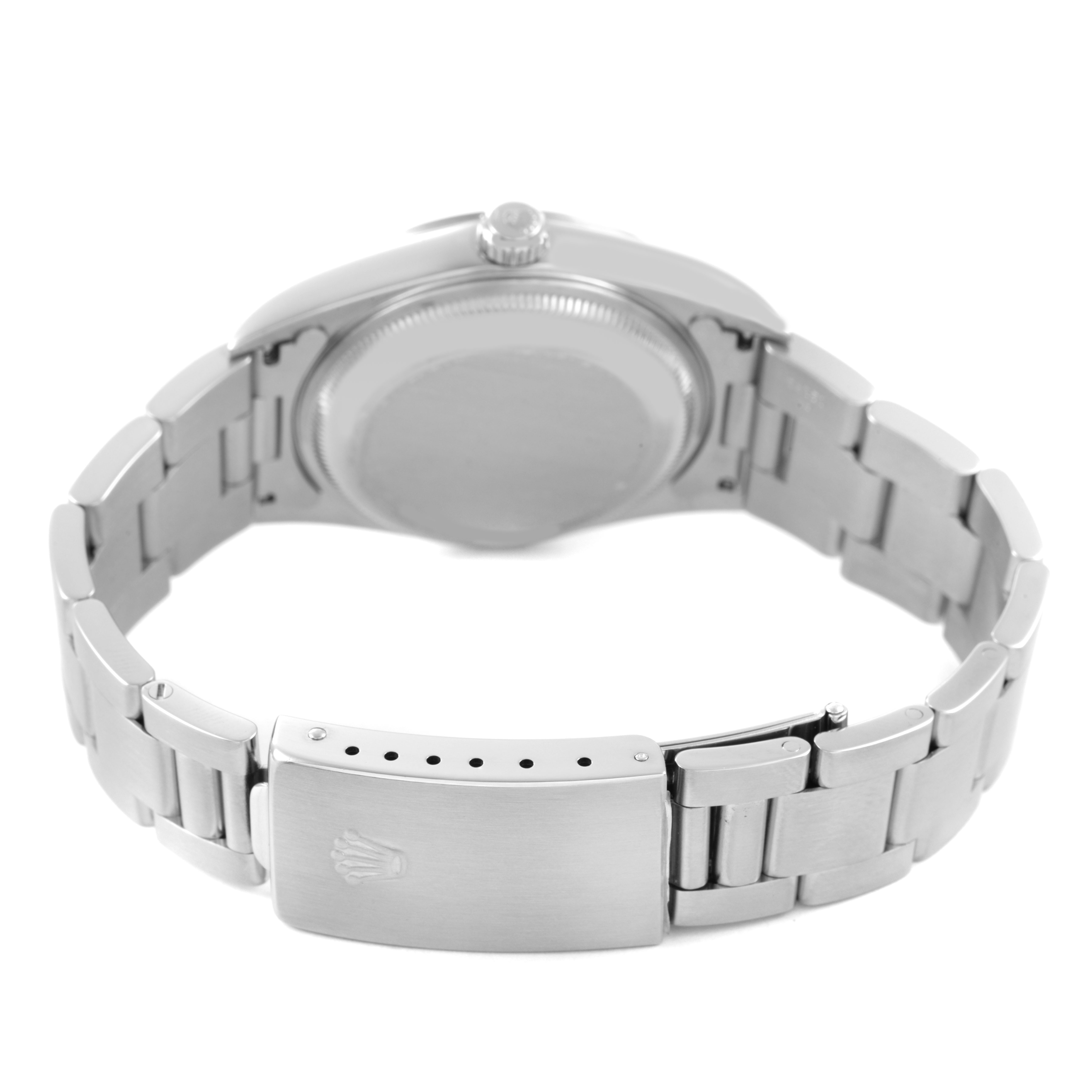 The image shows the back view of a Rolex Date 15200 Men's Stainless Steel Silver Dial model watch, highlighting the clasp, bracelet, and case back.