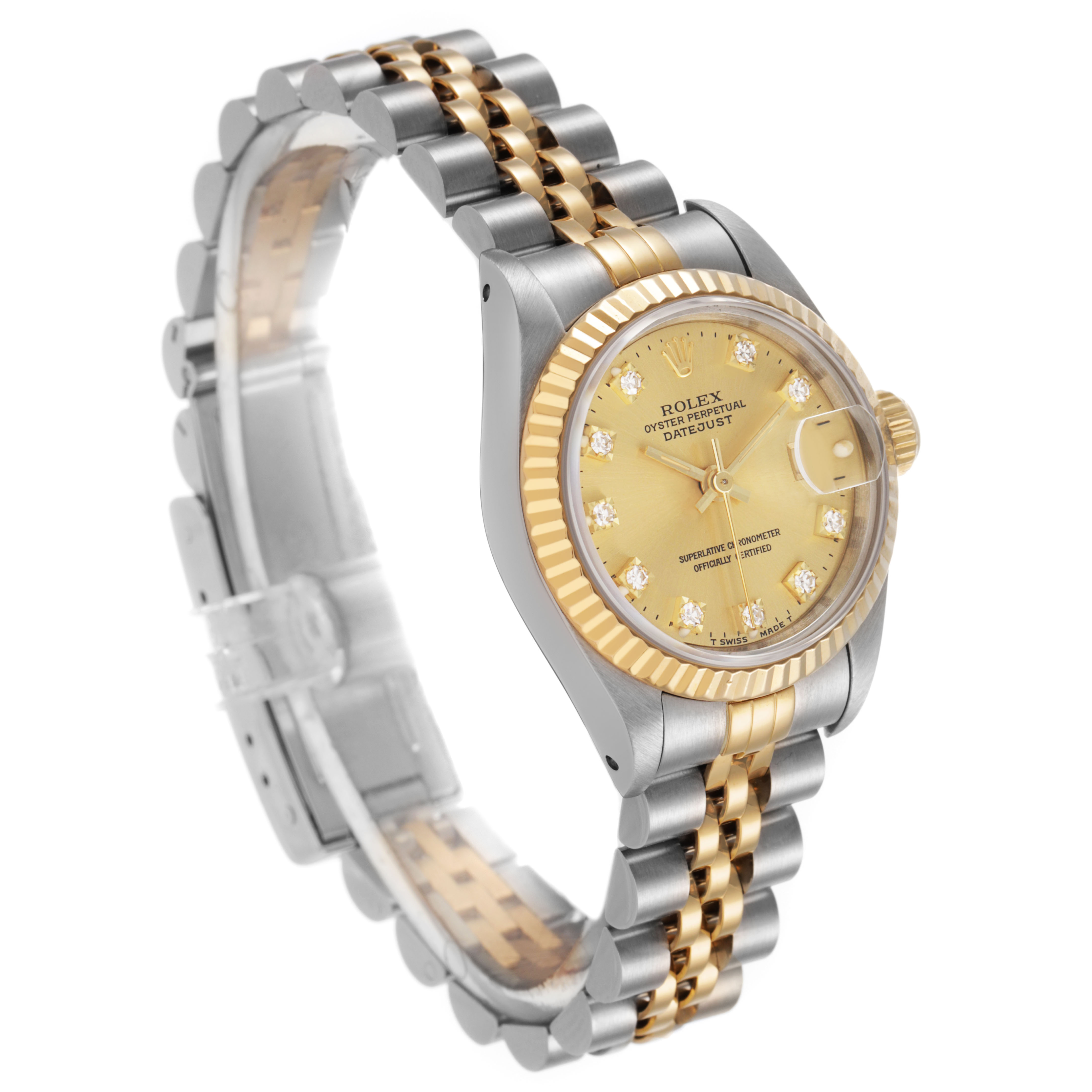 The Rolex Datejust 69173 Women's Steel and Gold (two tone) Champagne Dial watch is shown at a three-quarter angle, highlighting the face, bezel, and bracelet.
