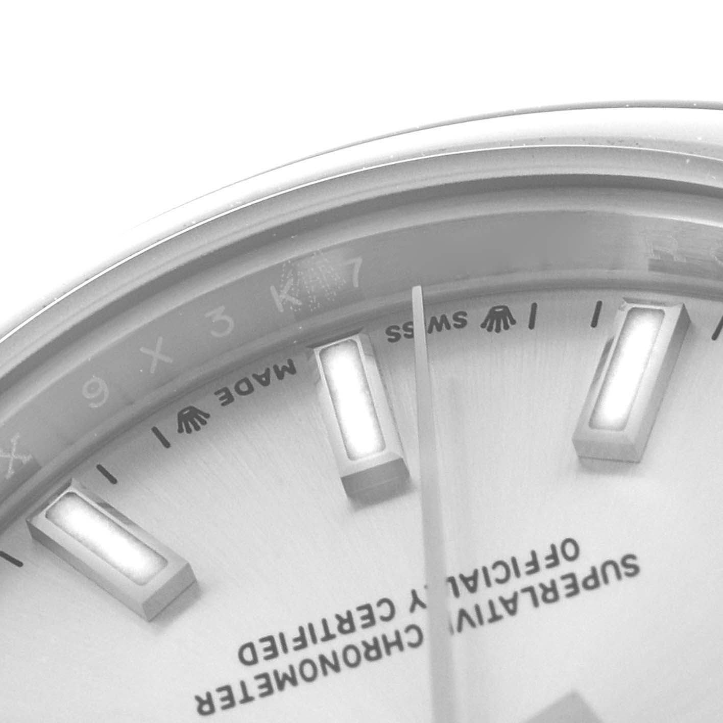 The image shows a close-up of the Rolex Datejust 279160 Women
s Stainless Steel Silver Dial 279160 Women
s Stainless Steel Silver Dial watch
s dial with hour markers and part of the text "OFFICIALLY CERTIFIED."