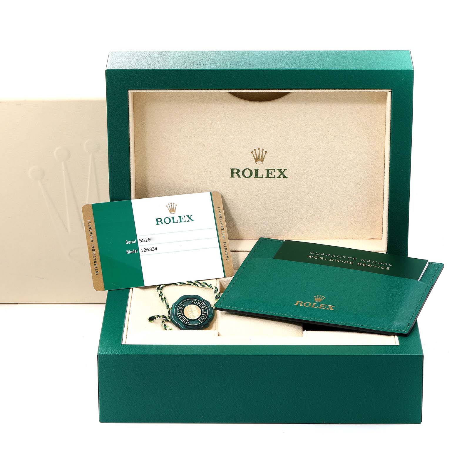 The image shows the packaging, warranty card, hang tag, and manual for a Rolex Datejust 41 126334 Men
s Stainless Steel Blue Dial 126334 Men
s Stainless Steel Blue Dial model.
