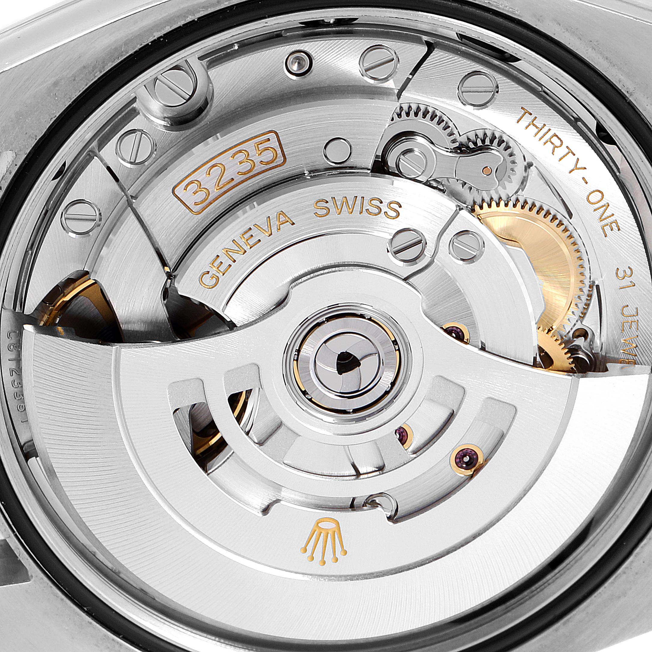 The image shows the movement mechanism of a Rolex Datejust 126281 Men's Rose Gold Black Dial 126281 Men's Rose Gold Black Dial watch, focusing on the 3235 caliber details.