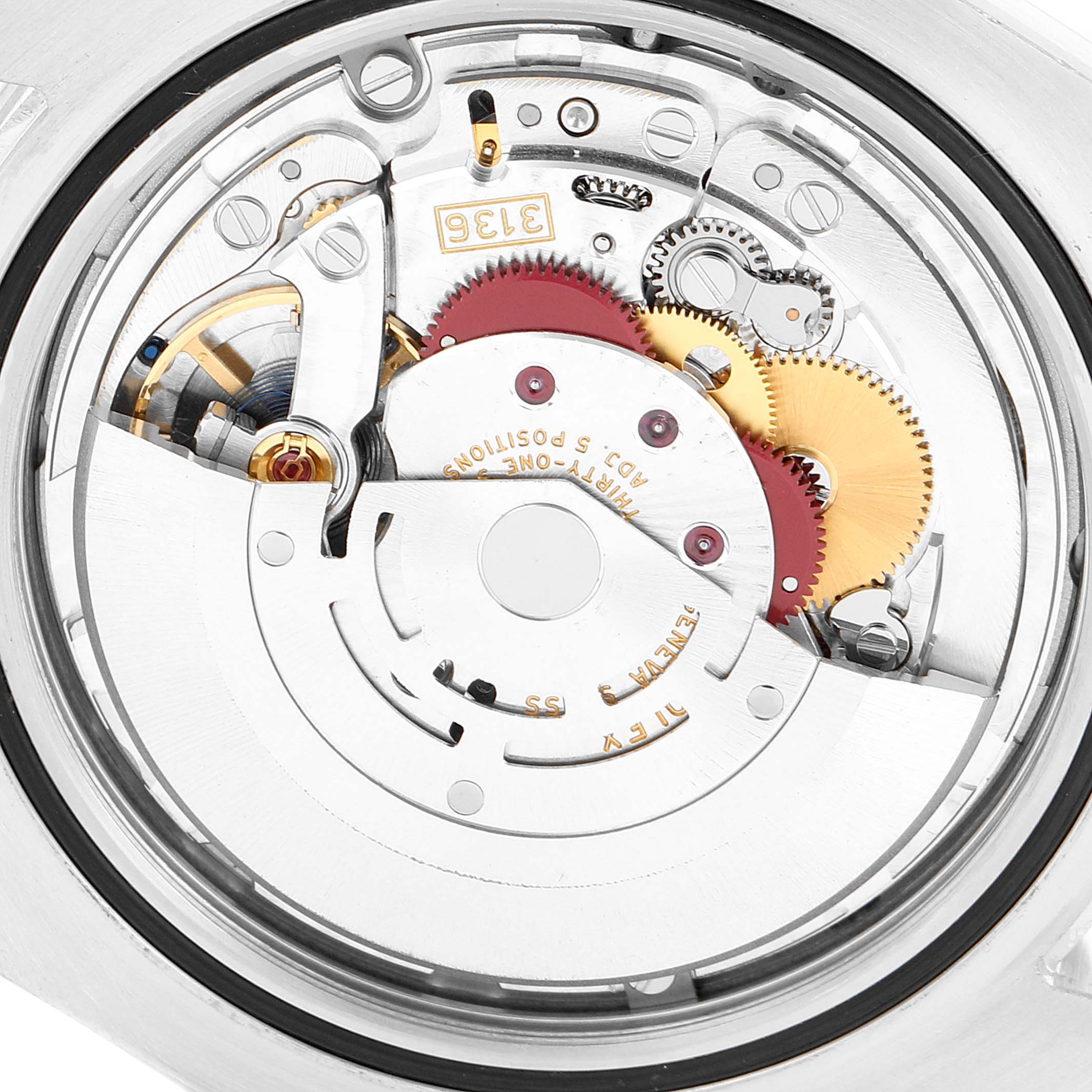 The image shows the movement mechanism of a Rolex Datejust 41 116334 Men
s Stainless Steel Blue Dial, viewed from the back, displaying gears and intricacies.