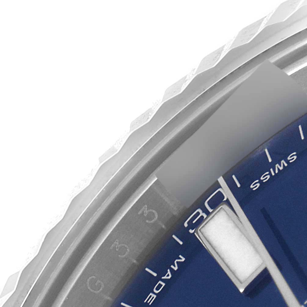 The image shows a close-up of the dial, bezel, and date of the Rolex Datejust 41 116334 Men
s Stainless Steel Blue Dial, angled to highlight the details.