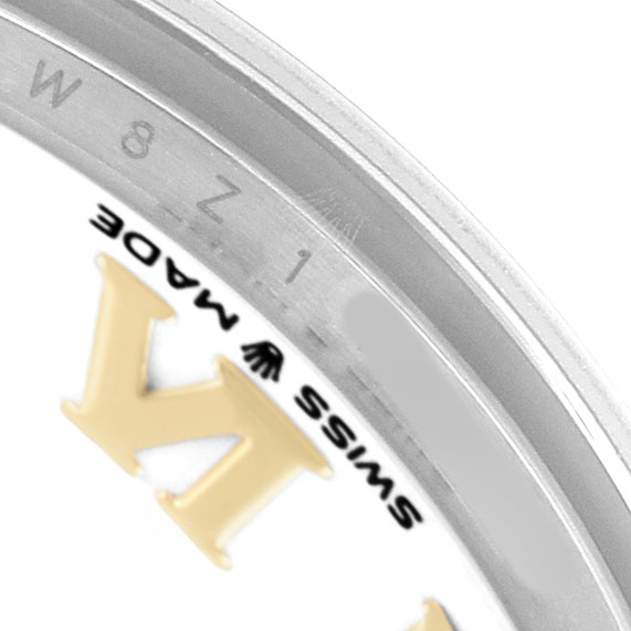 The image shows the bezel and edge of the dial of a Rolex Datejust 278273 Women's Steel and Gold (two tone) White Dial, highlighting the "Swiss Made" label and part of the markers.
