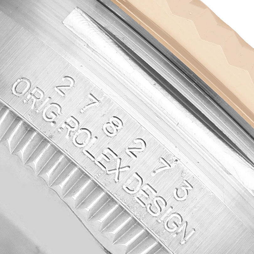 The image shows a close-up of the side engraving on a Rolex Datejust 278273 Women's Steel and Gold (two tone) White Dial watch, highlighting the model number and "ROLEX DESIGN."