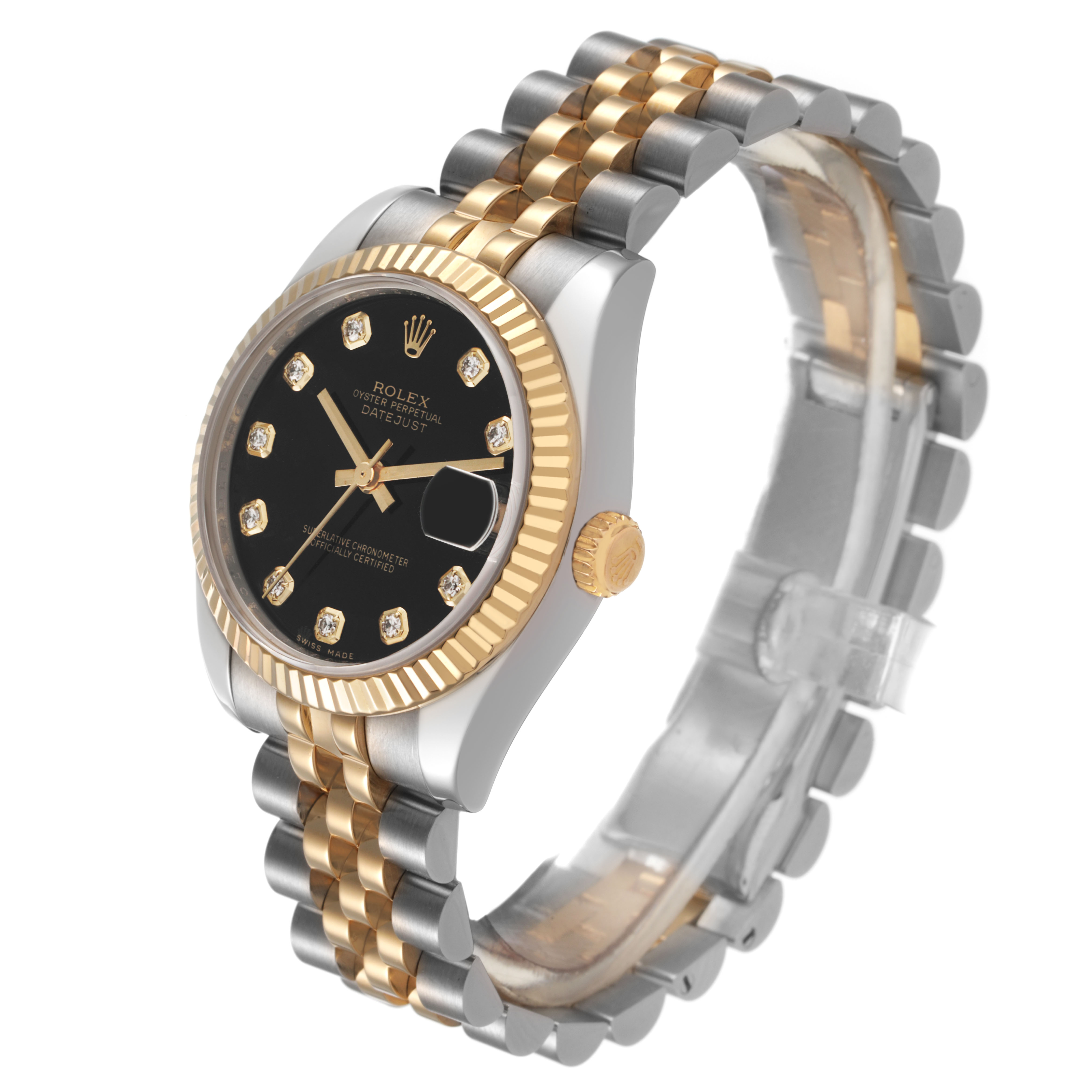 The Rolex Datejust 178273 Women's Steel and Gold (two tone) Black Dial watch is shown at an angled side view, highlighting the bezel, dial, crown, and two-tone bracelet.