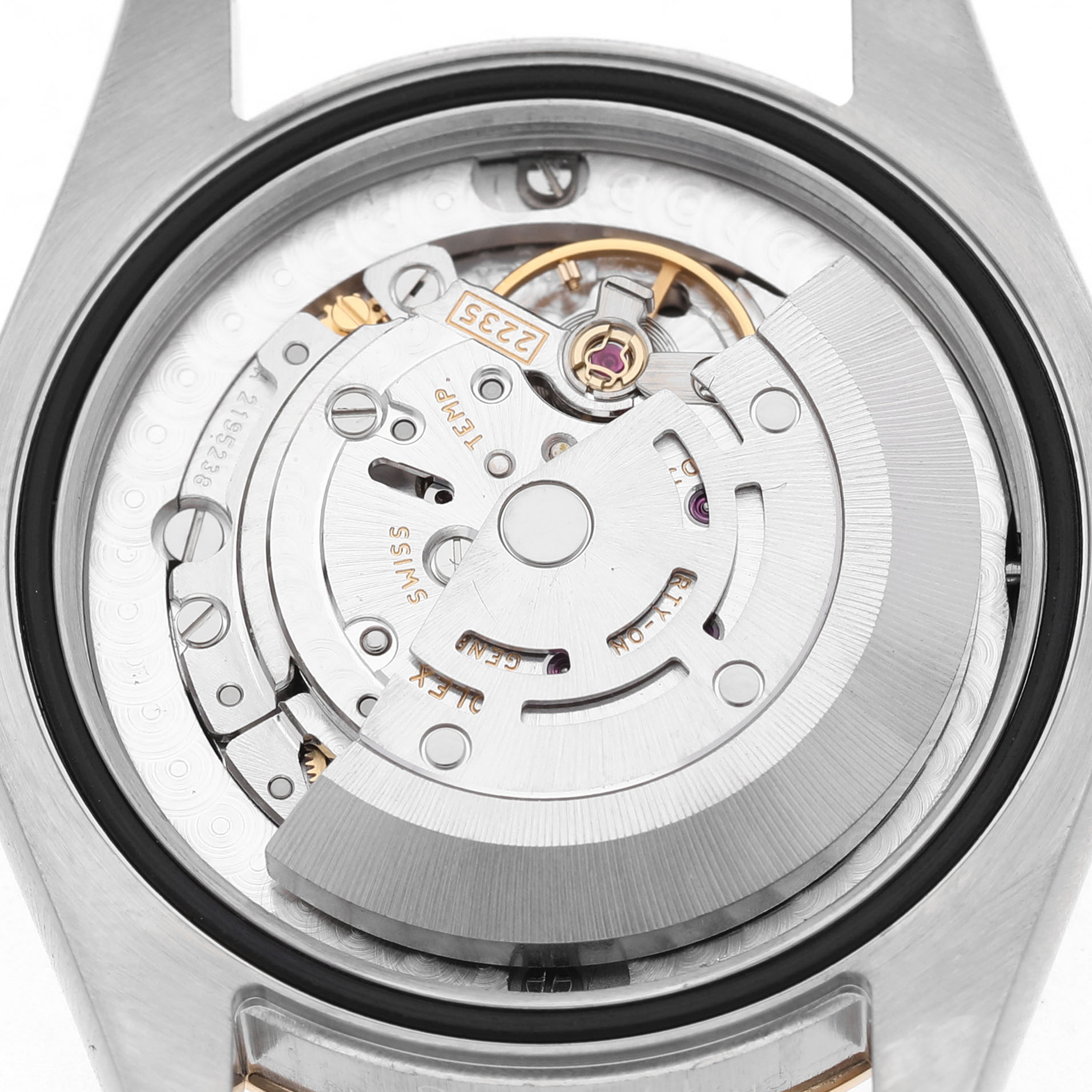 The image shows the movement of a Rolex Datejust 178273 Women's Steel and Gold (two tone) Black Dial watch from a back view, highlighting the rotor and gears.