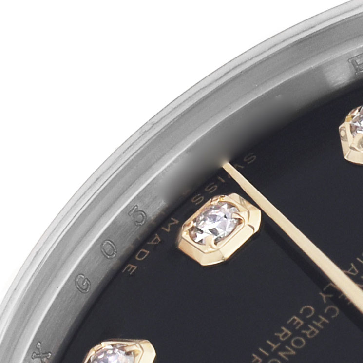 The image shows a close-up of the Rolex Datejust 178273 Women's Steel and Gold (two tone) Black Dial watch face with diamond hour markers and part of the bezel.