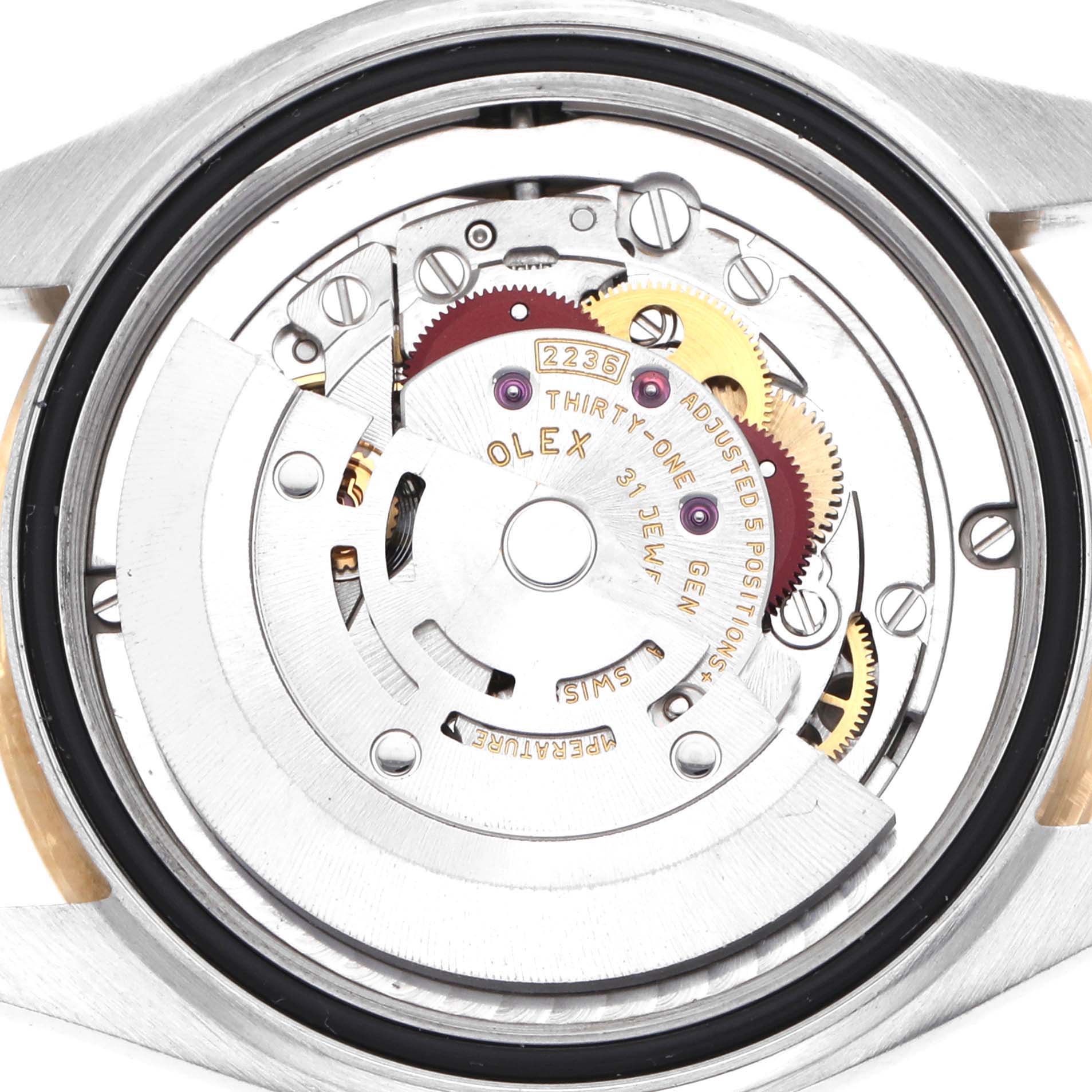 The image shows the back of the Rolex Datejust 278273 Men
s Stainless Steel Champagne Dial, highlighting its intricate movement and gears.