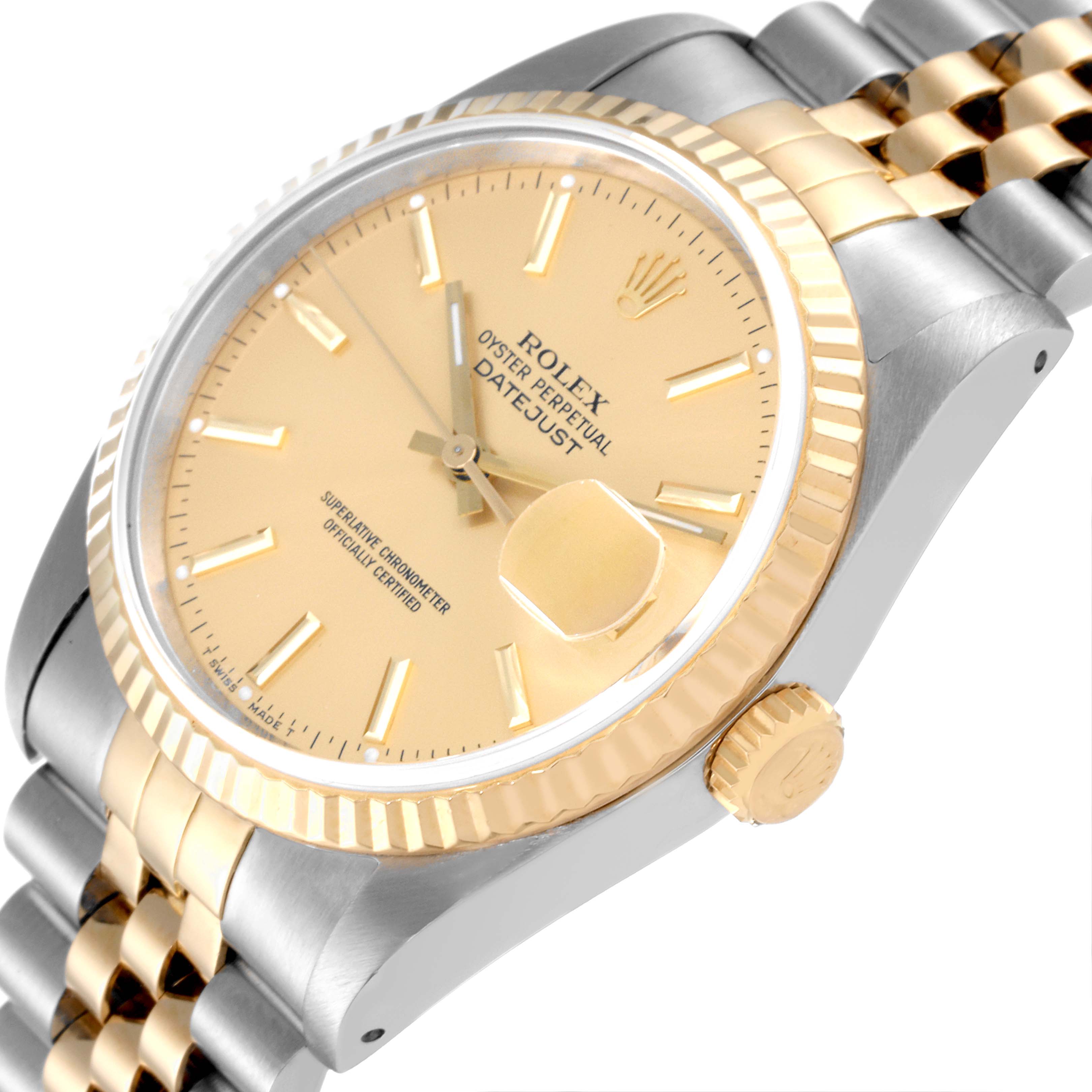 The Rolex Datejust 16233 Men's Steel and Gold (two tone) Champagne Dial 16233 Men's Steel and Gold (two tone) Champagne Dial watch is shown at a three-quarter angle, highlighting the gold dial, fluted bezel, crown, and Jubilee bracelet.