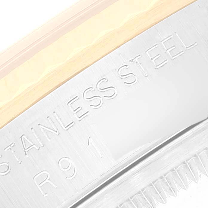 The image shows a close-up of the stainless steel case back of a Rolex Datejust 16233 Men's Steel and Gold (two tone) Champagne Dial 16233 Men's Steel and Gold (two tone) Champagne Dial watch.