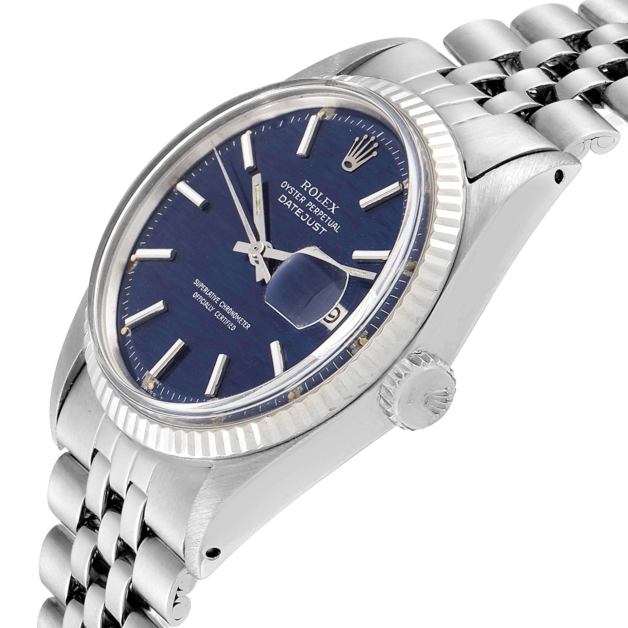 The Rolex Datejust 1601 Men
s Stainless Steel Blue Dial 1601 Men
s Stainless Steel Blue Dial watch is shown at an angled view, highlighting the blue dial, hour markers, bezel, crown, and bracelet.