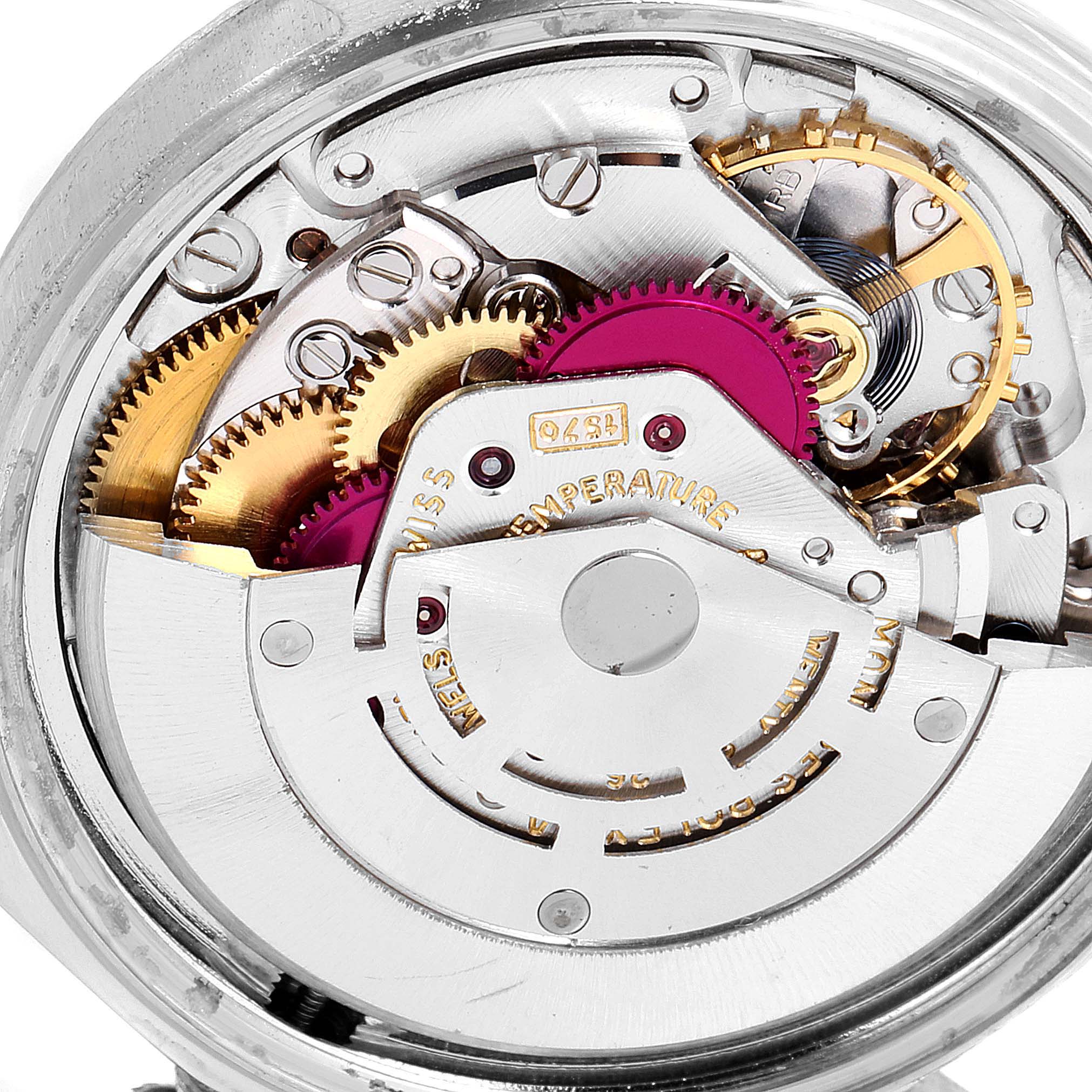 This is a close-up image of the internal movement components of a Rolex Datejust 1601 Men
s Stainless Steel Blue Dial 1601 Men
s Stainless Steel Blue Dial watch.