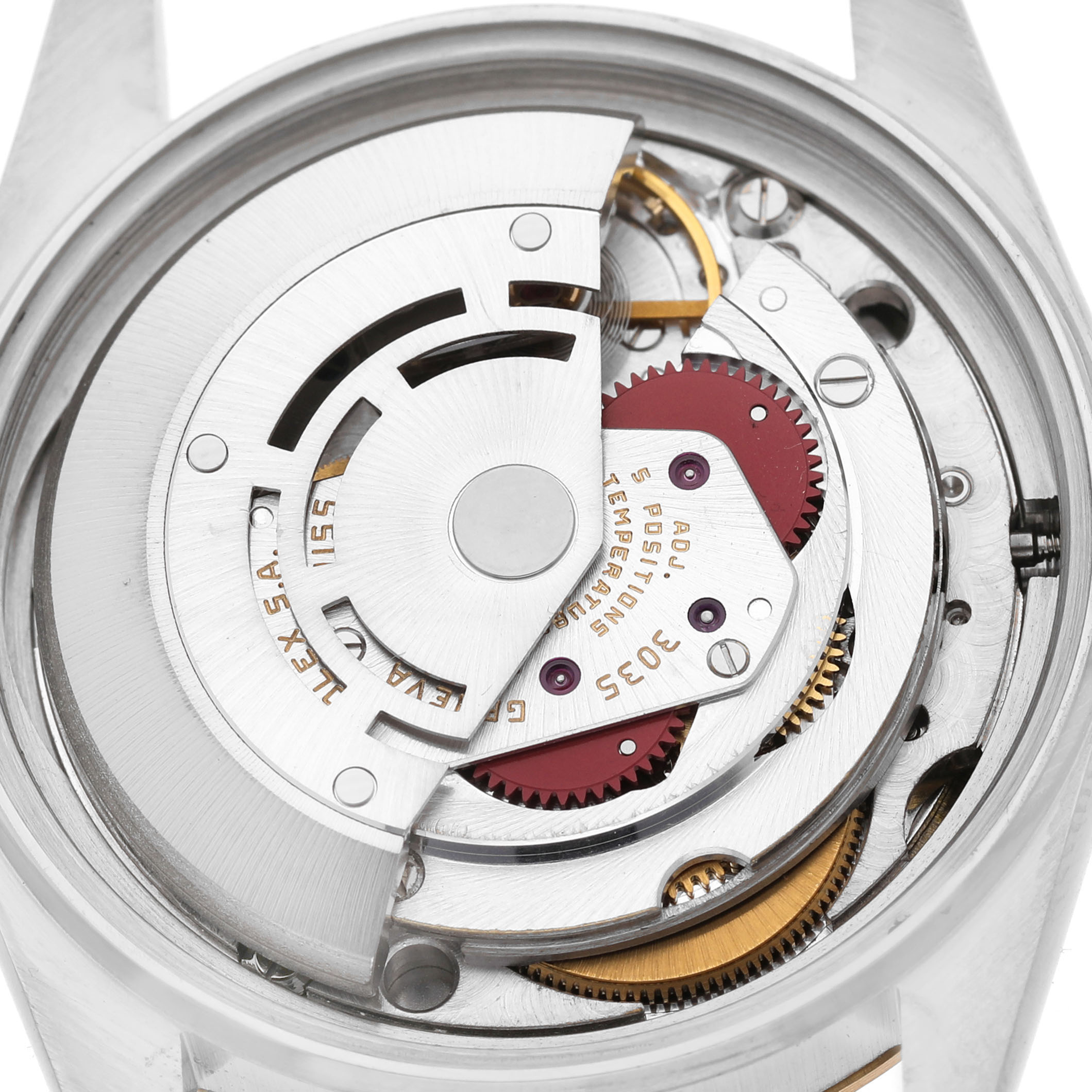This image shows the internal movement of a Rolex Datejust 16013 Men's Steel and Gold (two tone) Champagne Dial watch, highlighting the rotor and gears from a top-down angle.