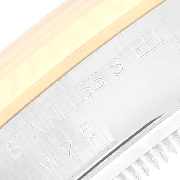 This image shows a close-up of the stainless steel side and bezel of the Rolex Datejust 16233 Men's Steel and Gold (two tone) Champagne Dial 16233 Men's Steel and Gold (two tone) Champagne Dial watch.