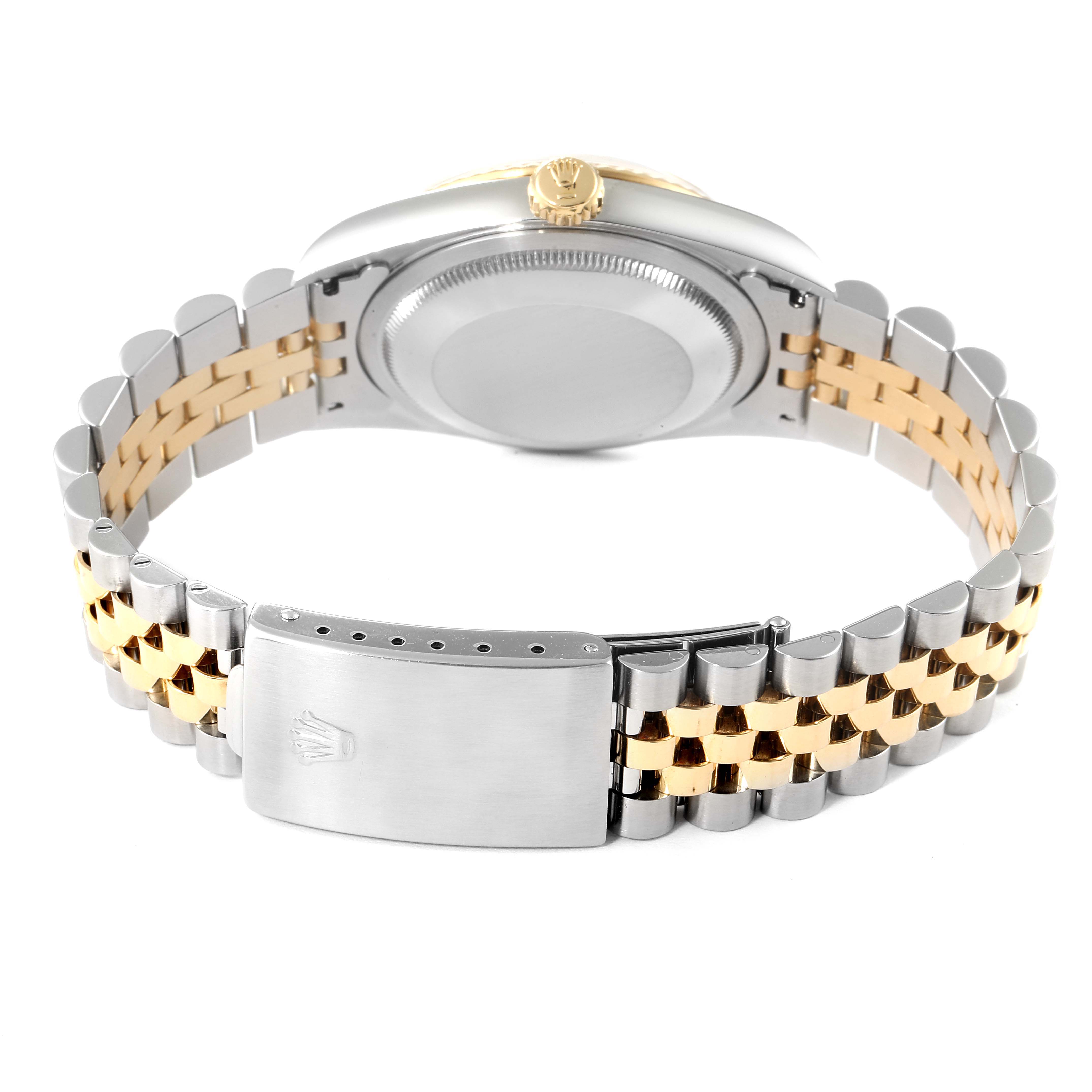 This Rolex Datejust 16233 Men
s Steel and Gold (two tone) Grey Dial 16233 Men
s Steel and Gold (two tone) Grey Dial watch is shown from the back, highlighting the case back and two-tone bracelet with a clasp.