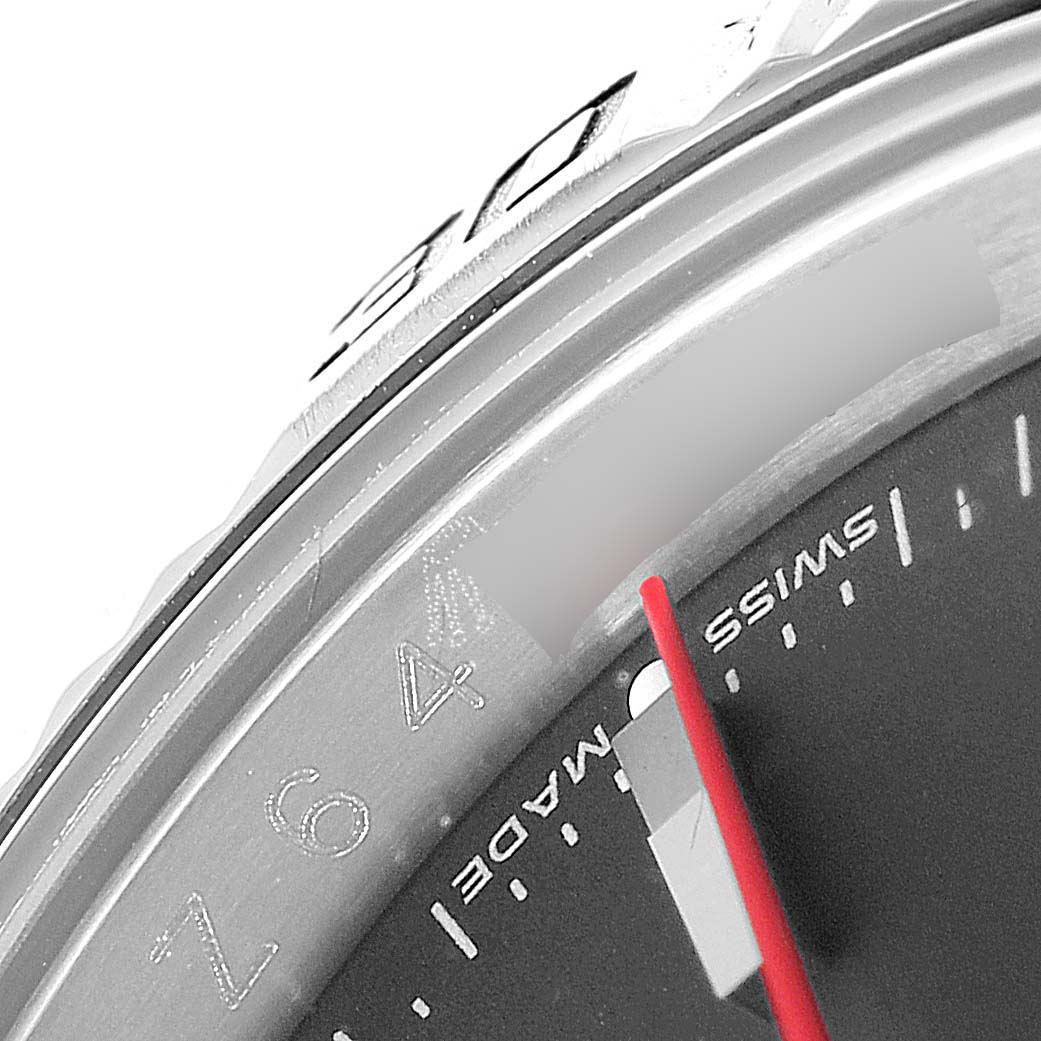 This image shows a close-up of the dial and bezel of the Rolex Turn-o-Graph 116264 Men's Stainless Steel Black Dial 116264 Men's Stainless Steel Black Dial watch, capturing the "Swiss Made" text and 64 marker.