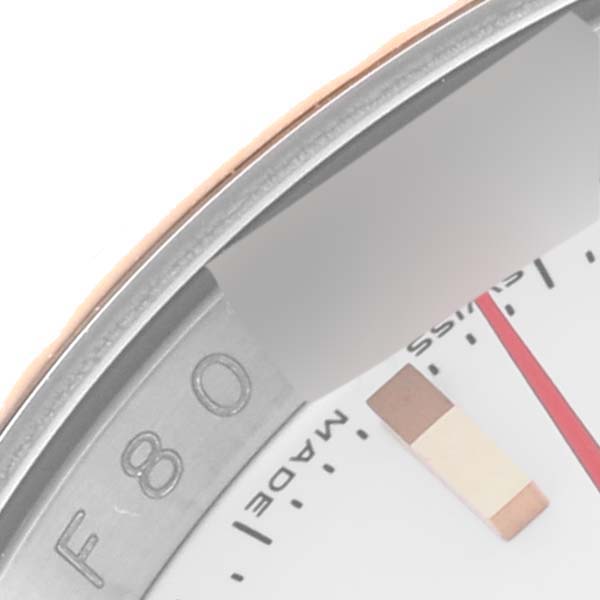 The image shows a close-up of the Rolex Datejust 116261 Men
s Stainless Steel White Dial watch dial, focusing on the edge, part of the bezel, and markers.