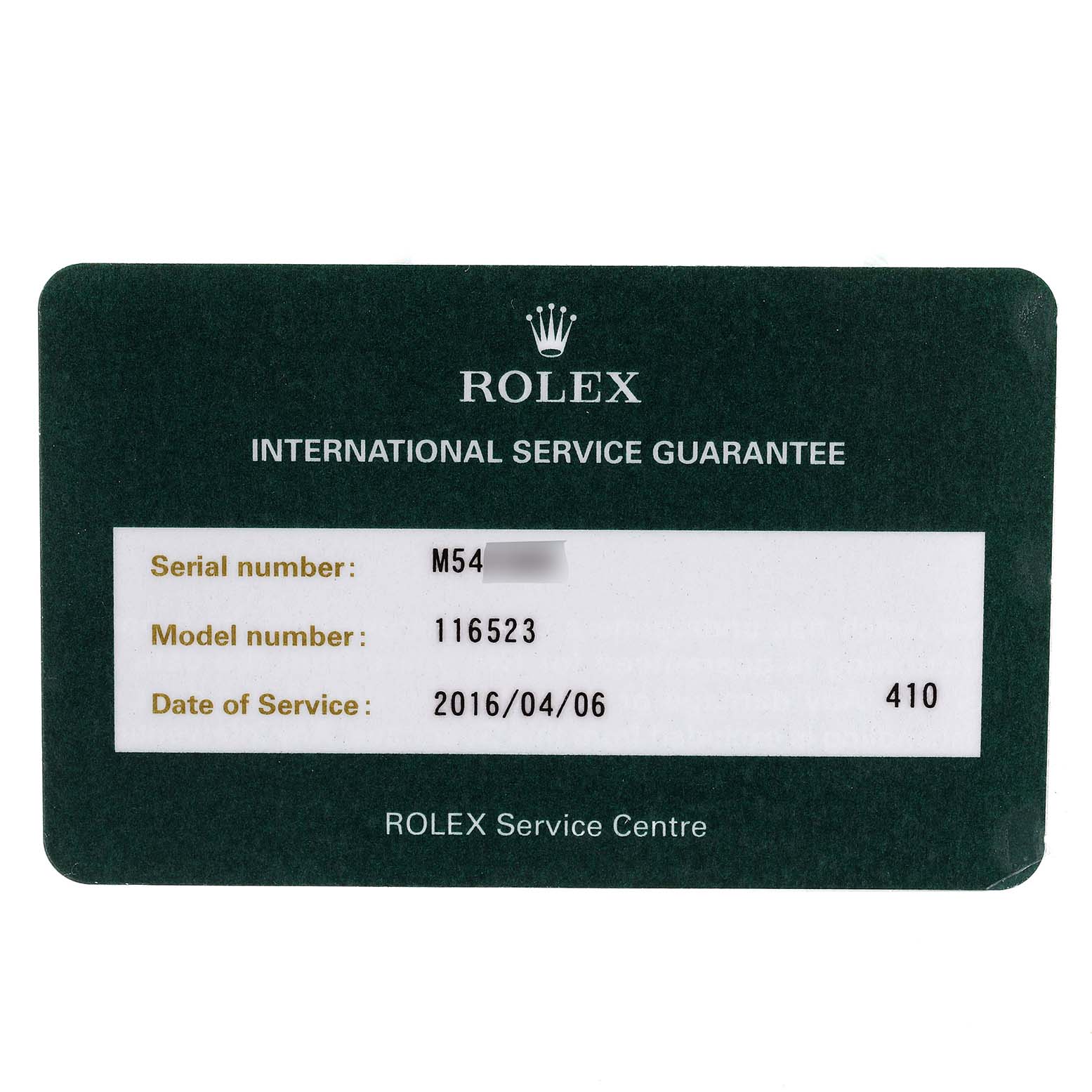 This is an international service guarantee card for a Rolex Daytona 116523 Men
s Steel and Gold (two tone) Mother of Pearl Dial 116523 Men
s Steel and Gold (two tone) Mother of Pearl Dial model watch, displaying model number 116523 and service details.