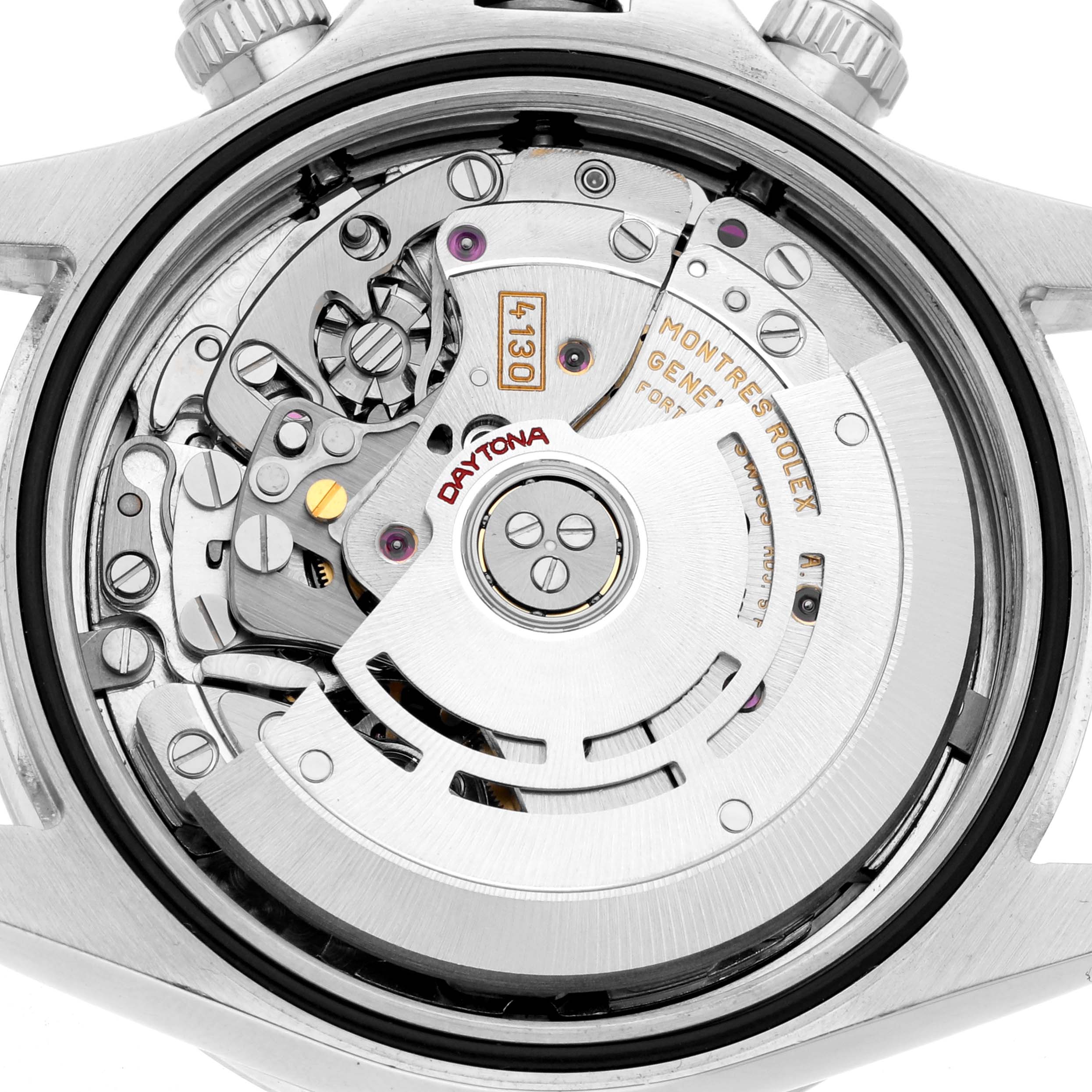 The image shows the back view of a Rolex Daytona 116520 Men
s Stainless Steel White Dial, highlighting its intricate movement and components.