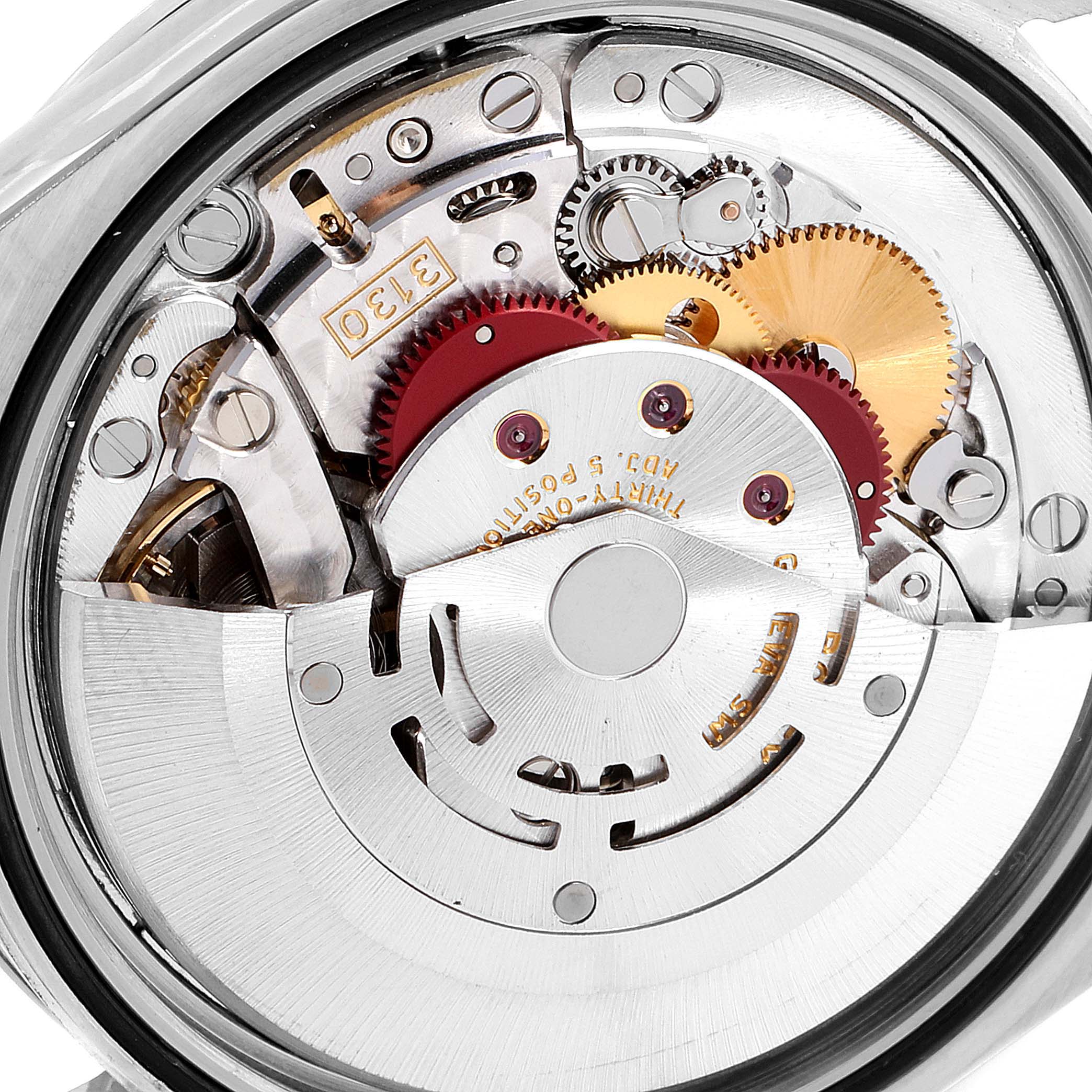 This image shows a close-up view of the movement inside a Rolex Explorer 114270 Men
s Stainless Steel Black Dial 114270 Men
s Stainless Steel Black Dial watch.