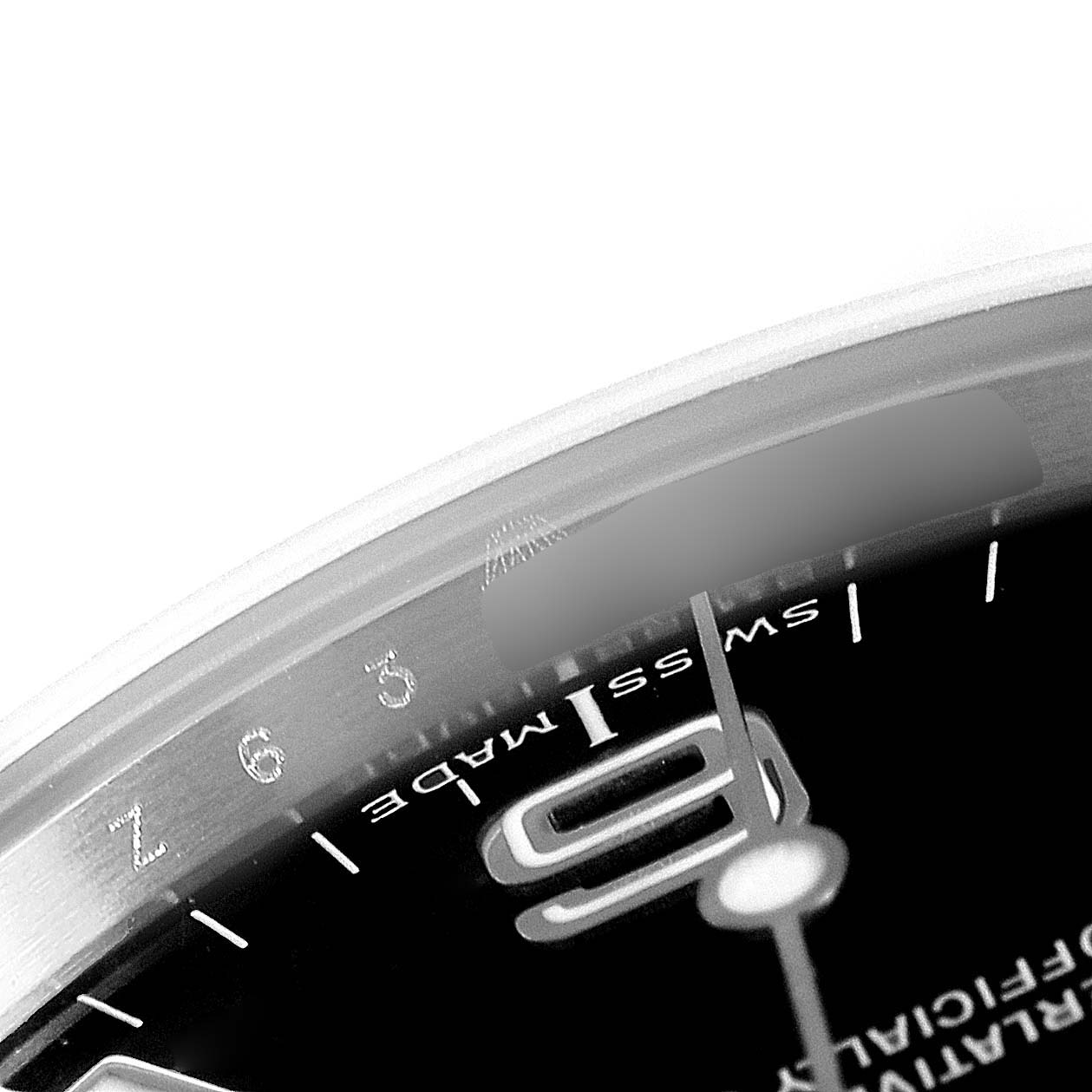 This close-up image shows part of the dial and bezel of the Rolex Explorer 114270 Men
s Stainless Steel Black Dial 114270 Men
s Stainless Steel Black Dial watch, highlighting the "9" marker and "Swiss Made" text.