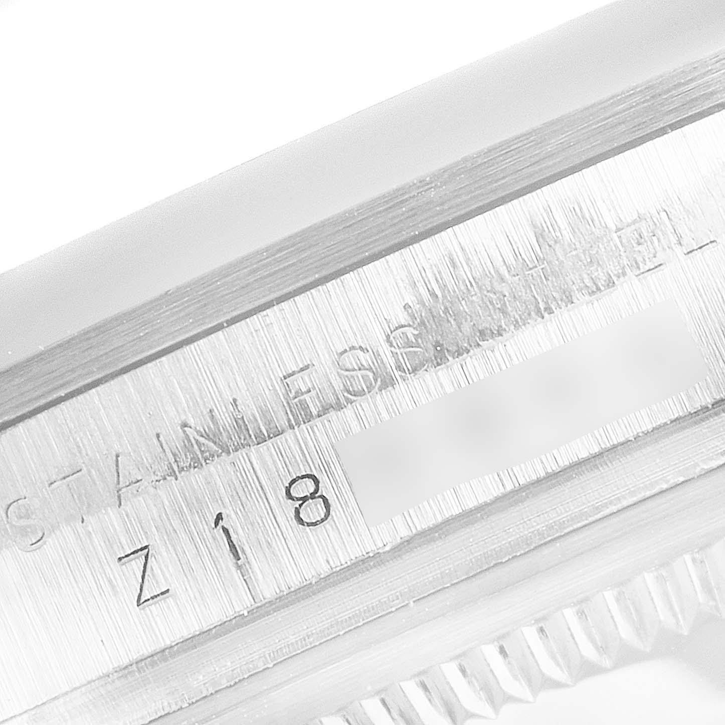 This image shows a close-up of the stainless steel casing and bezel edge of a Rolex Explorer 114270 Men
s Stainless Steel Black Dial 114270 Men
s Stainless Steel Black Dial watch.