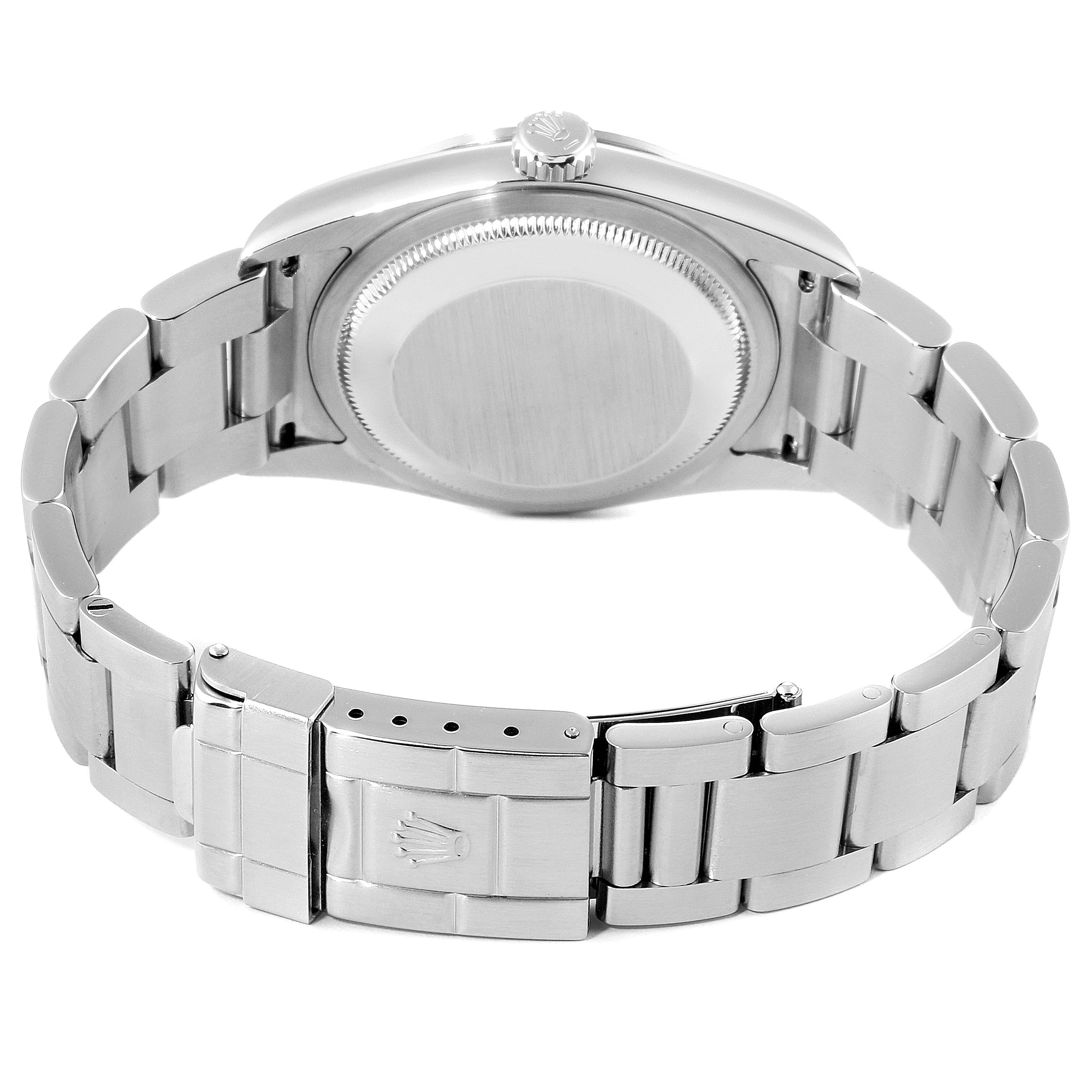 This image shows the back view of the Rolex Explorer 114270 Men
s Stainless Steel Black Dial 114270 Men
s Stainless Steel Black Dial watch, displaying the case back, screw-down crown, and the Oyster bracelet clasp.