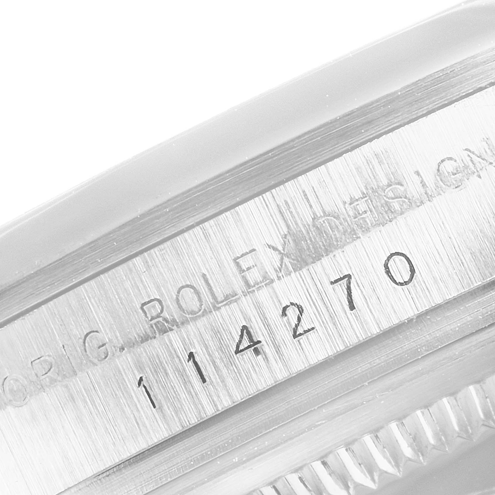 The image shows a close-up view of the case side of a Rolex Explorer 114270 Men
s Stainless Steel Black Dial 114270 Men
s Stainless Steel Black Dial watch, focusing on the engraved model number "114270".