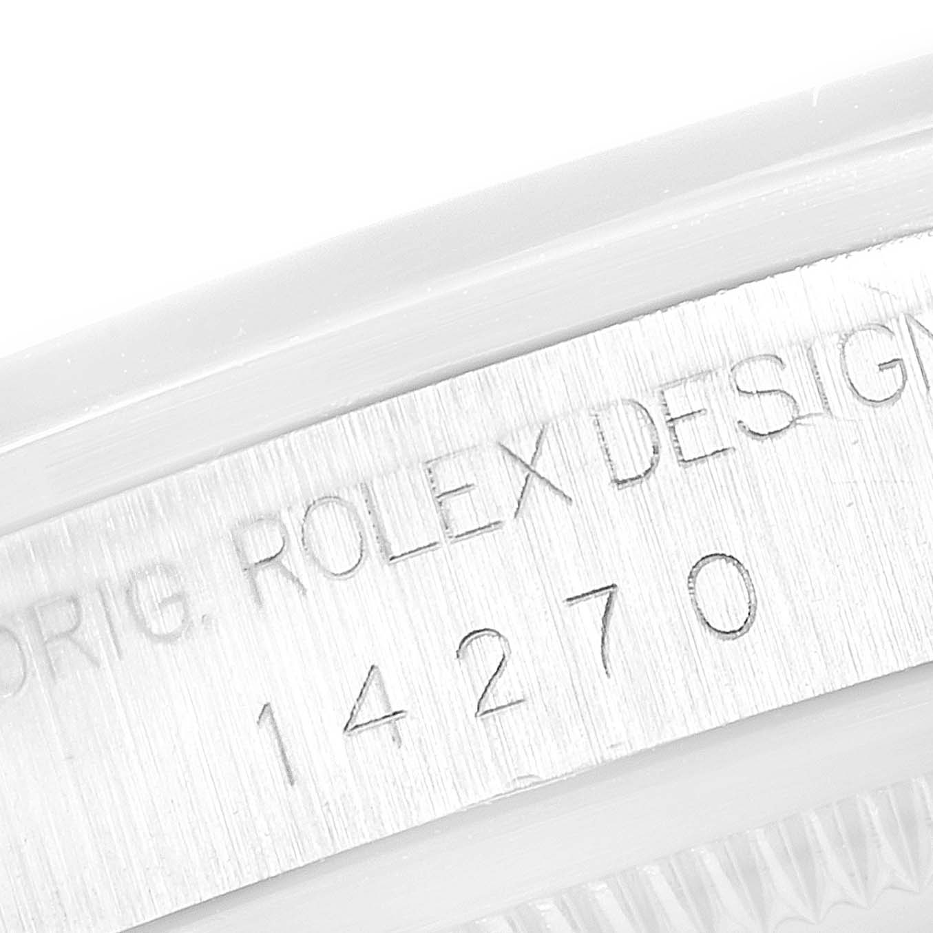 This image shows a close-up angle of the Rolex Explorer 14270 Men
s Stainless Steel Black Dial 14270 Men
s Stainless Steel Black Dial model watch
s case with its engraved model number 14270.