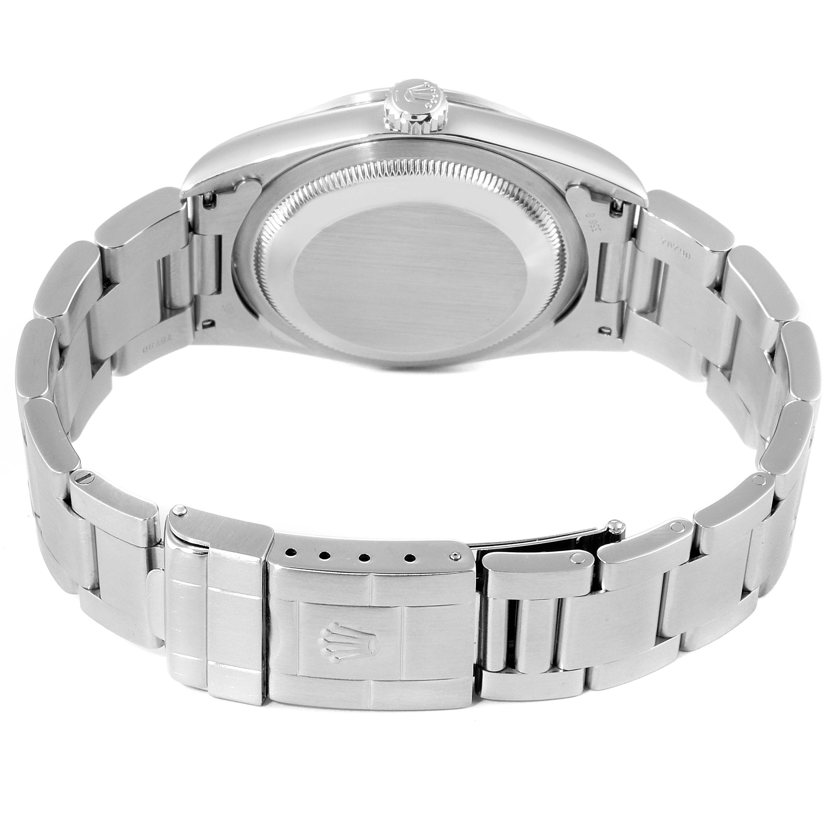 The image shows the back view of the Rolex Explorer 14270 Men
s Stainless Steel Black Dial 14270 Men
s Stainless Steel Black Dial watch, highlighting the case back, bracelet, and clasp.