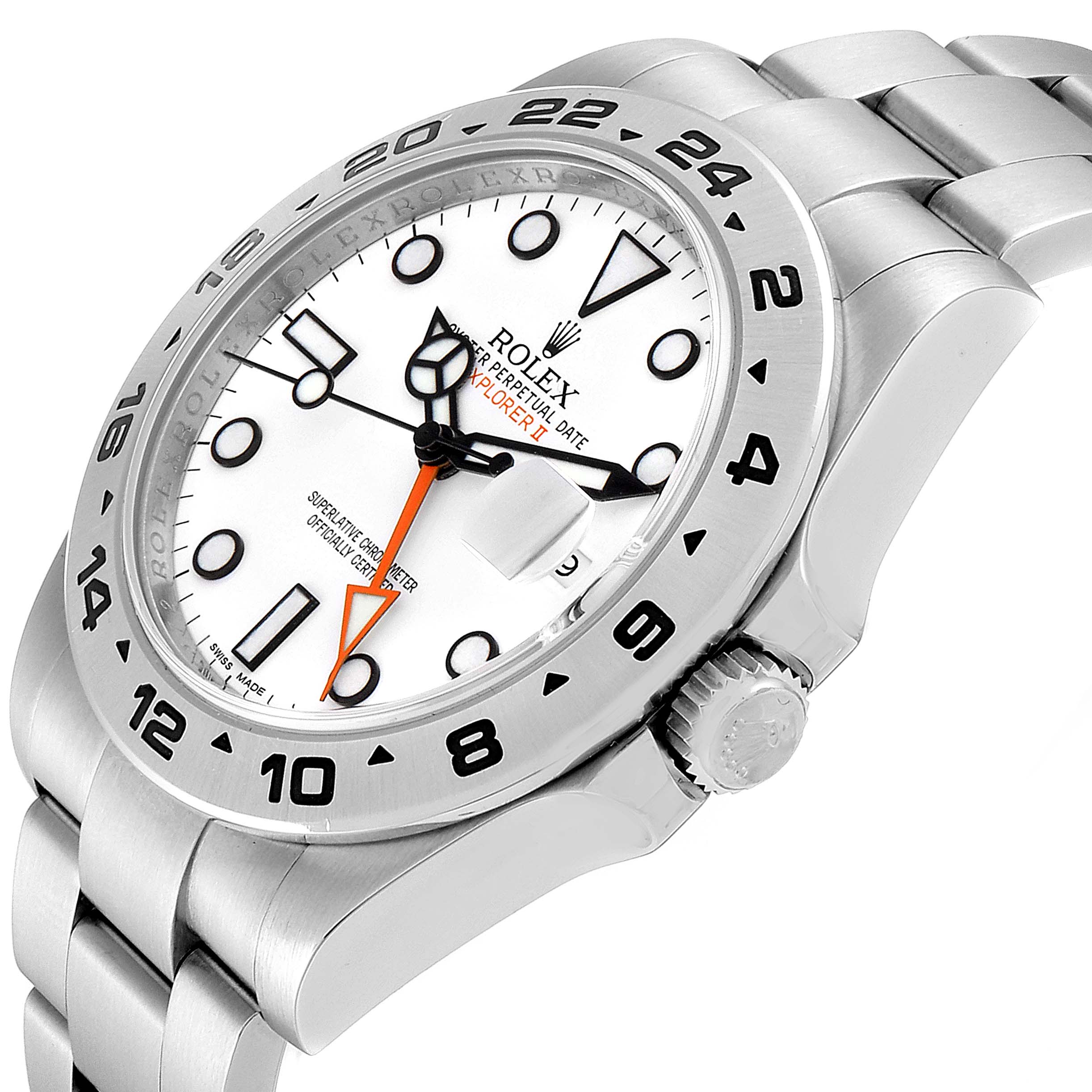The Rolex Explorer 216570 Men
s Stainless Steel White Dial 216570 Men
s Stainless Steel White Dial watch is shown from a front-side angle, displaying its face, bezel, crown, and part of the bracelet.